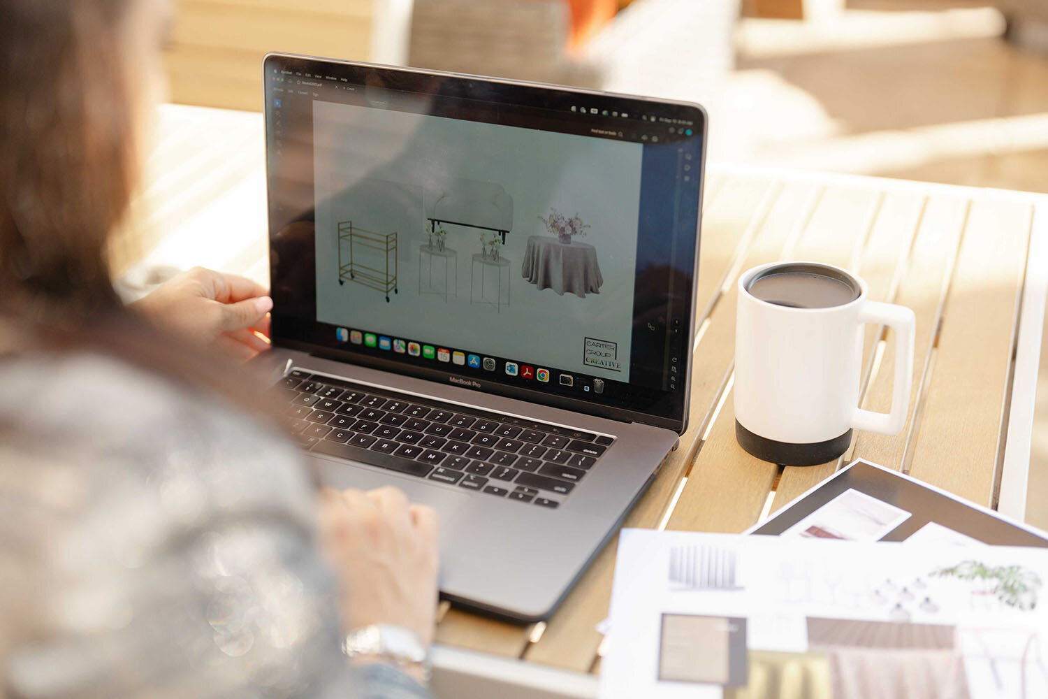events planner working on a mockup during Gainesville,Virginia branding pictures
