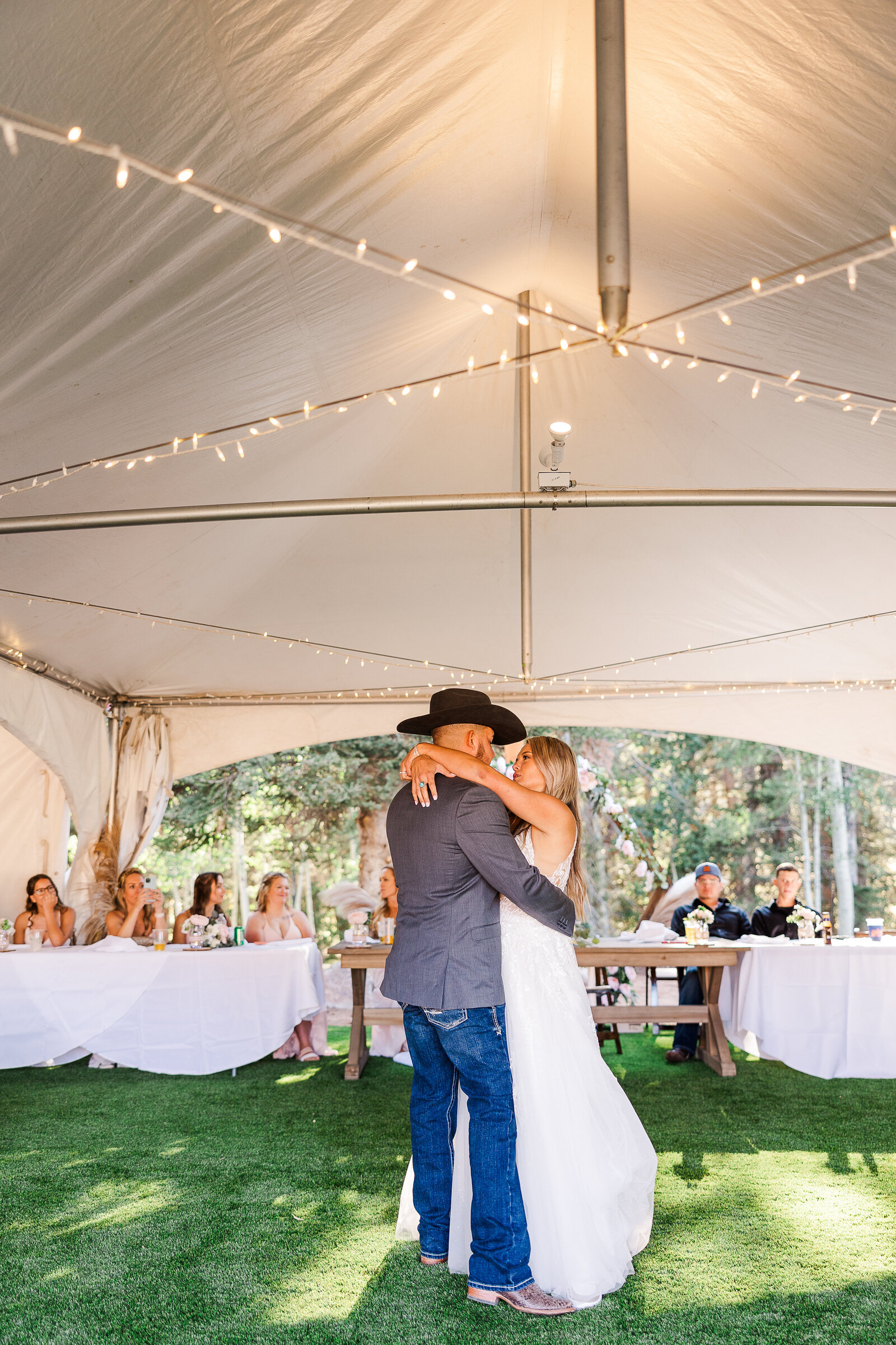 Far away image of newlywed couple sharing first dance