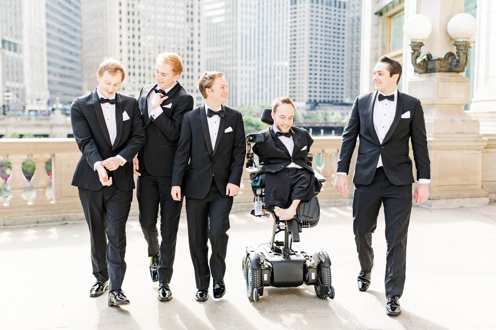 66_groomsmen_walking_and_laughing_downtown_chicago