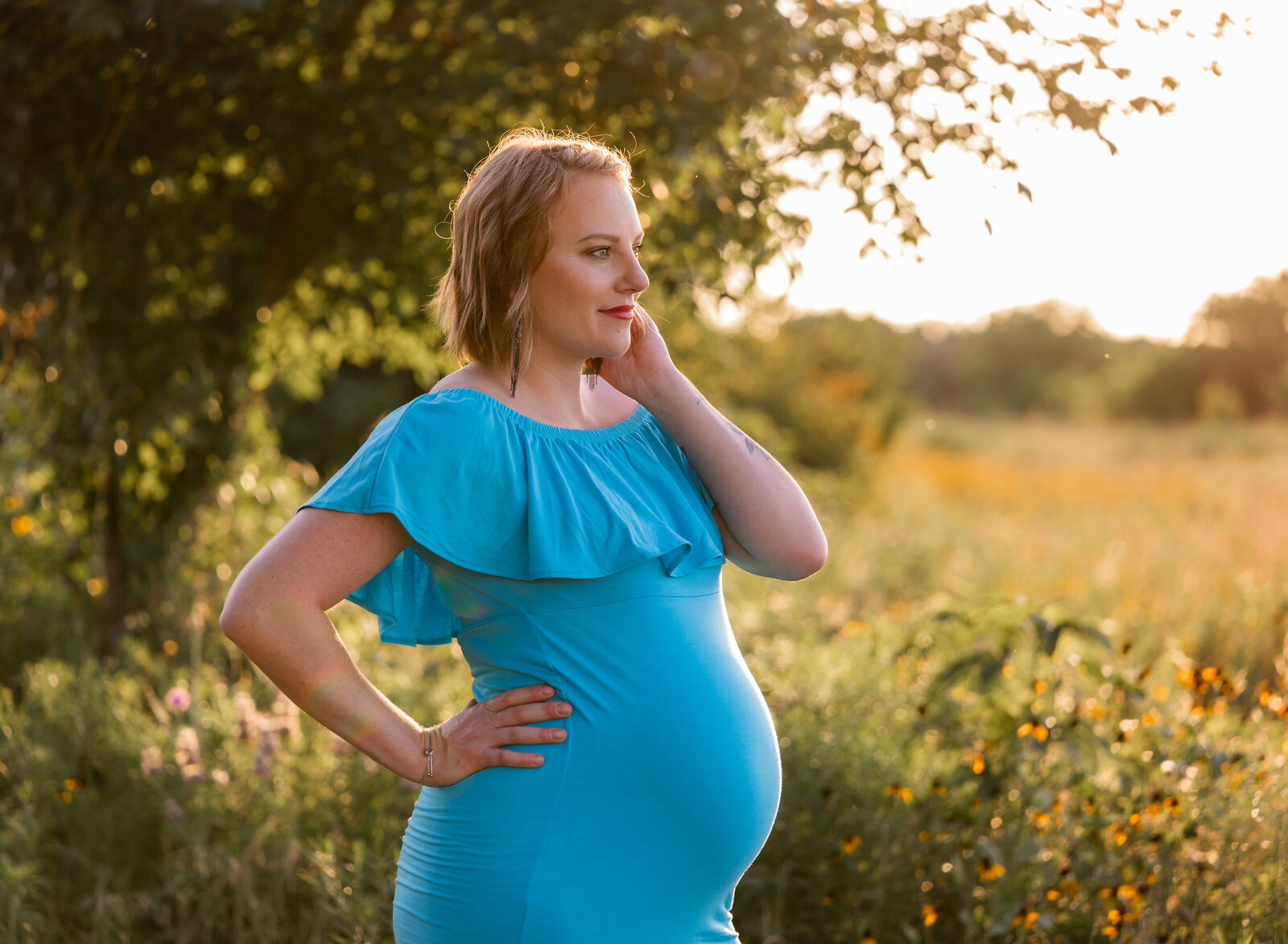 pregnant woman with wildflowers