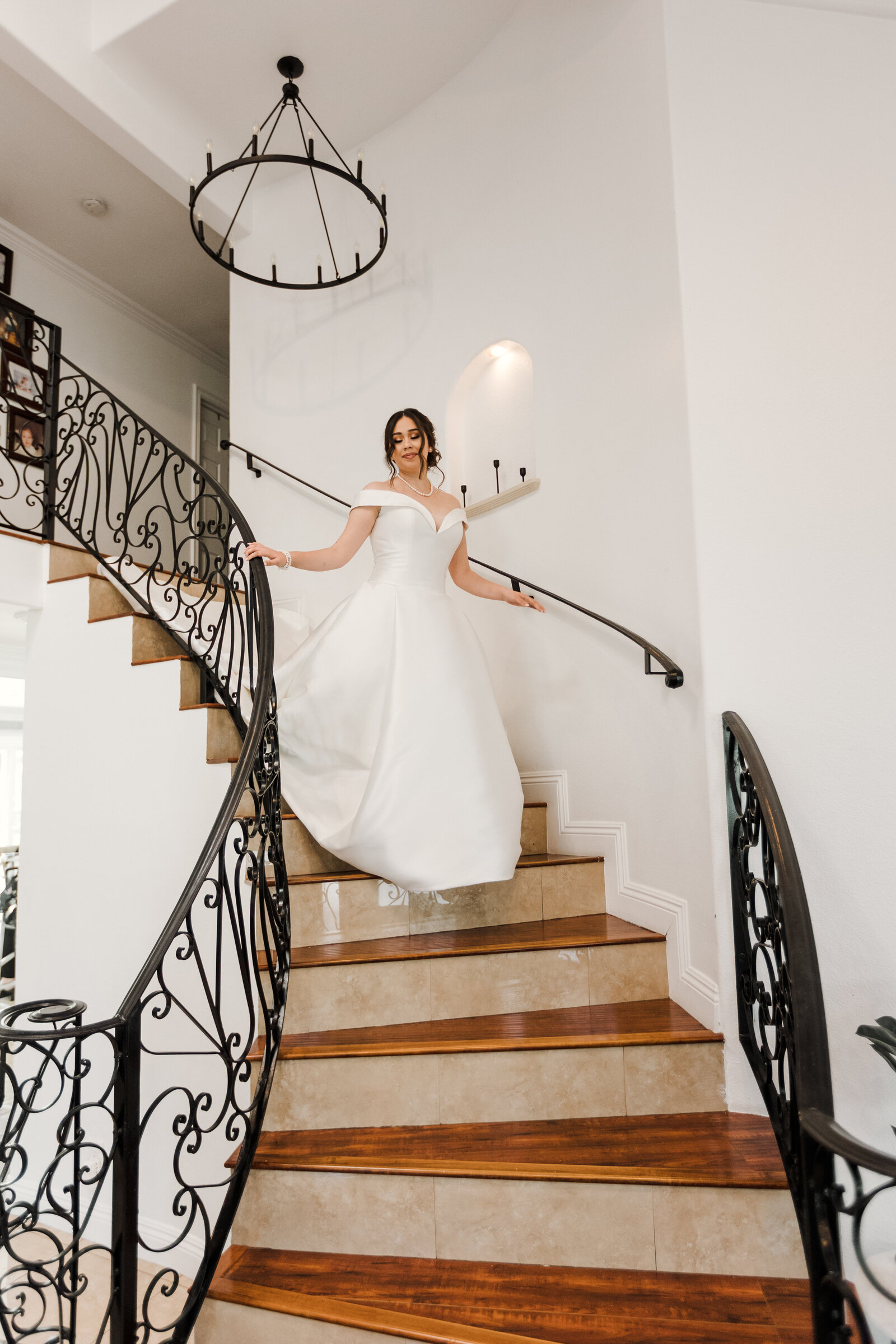 Bride to be walks down the princess staircase in Santa Ana