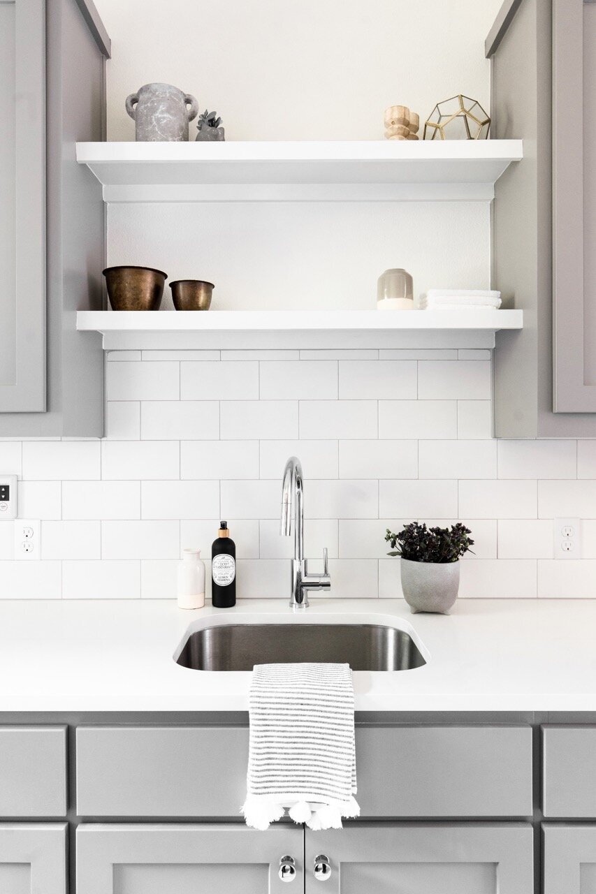 Nuela Designs Gray and White Laundry Room with Floating Shelves