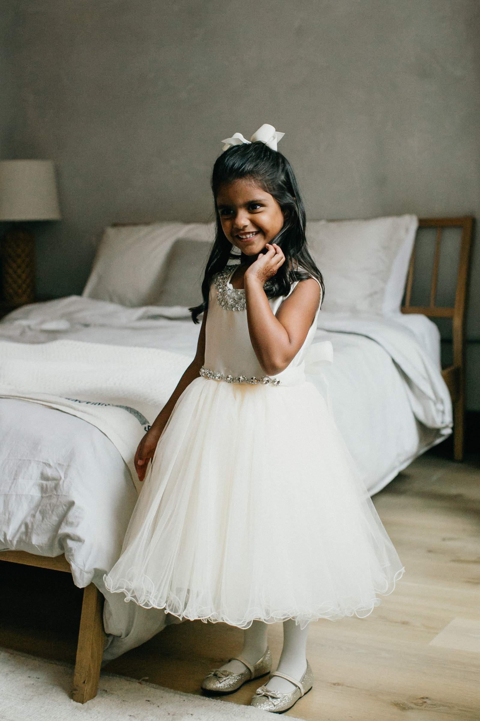 Gorgeous flower girl photographed in Lokal Hotel suite in Old City.