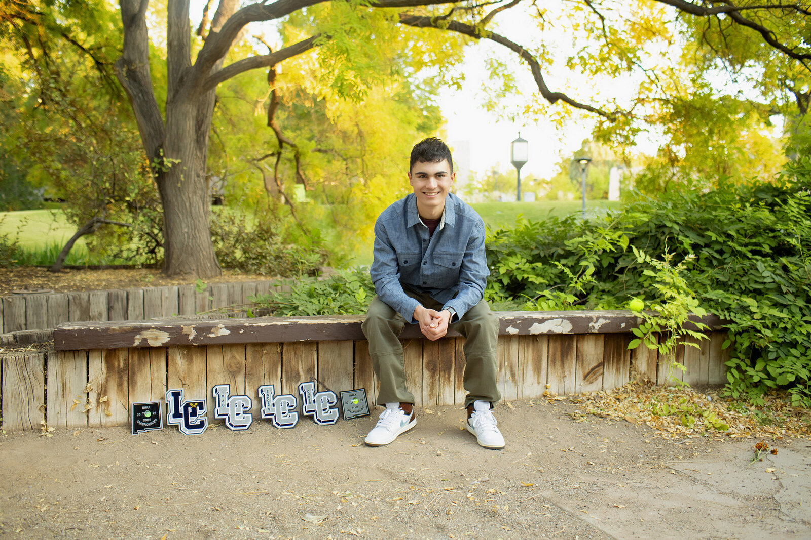Senior-boy-session-with-varsity-letters-UNM