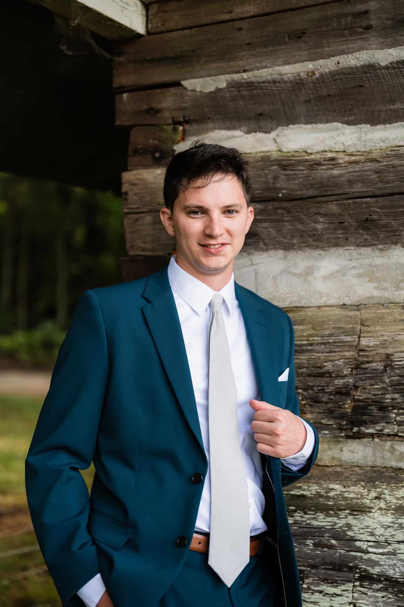 portrait of the groom at terra incognita vineyard wedding venue