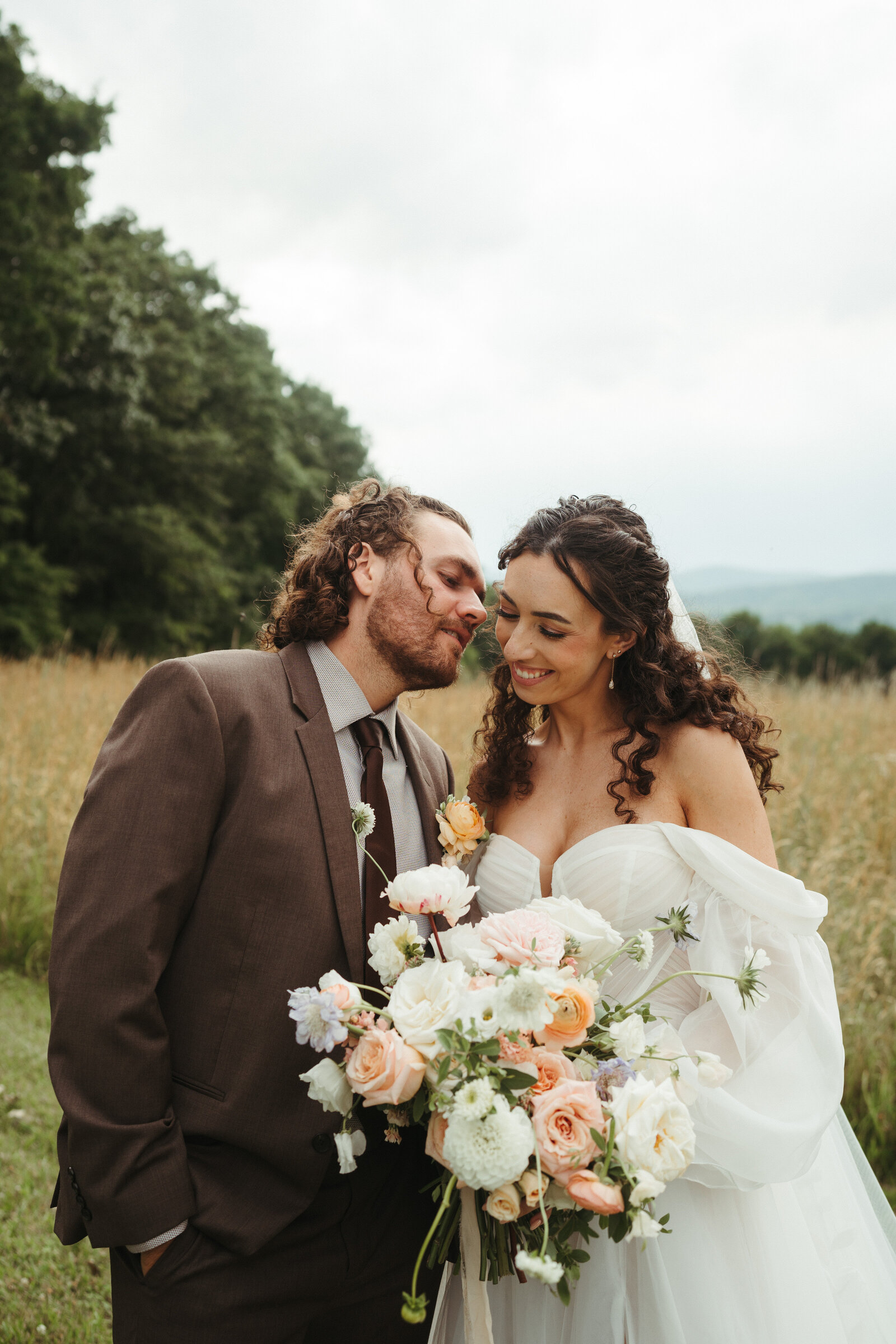bride and groom standing side by side