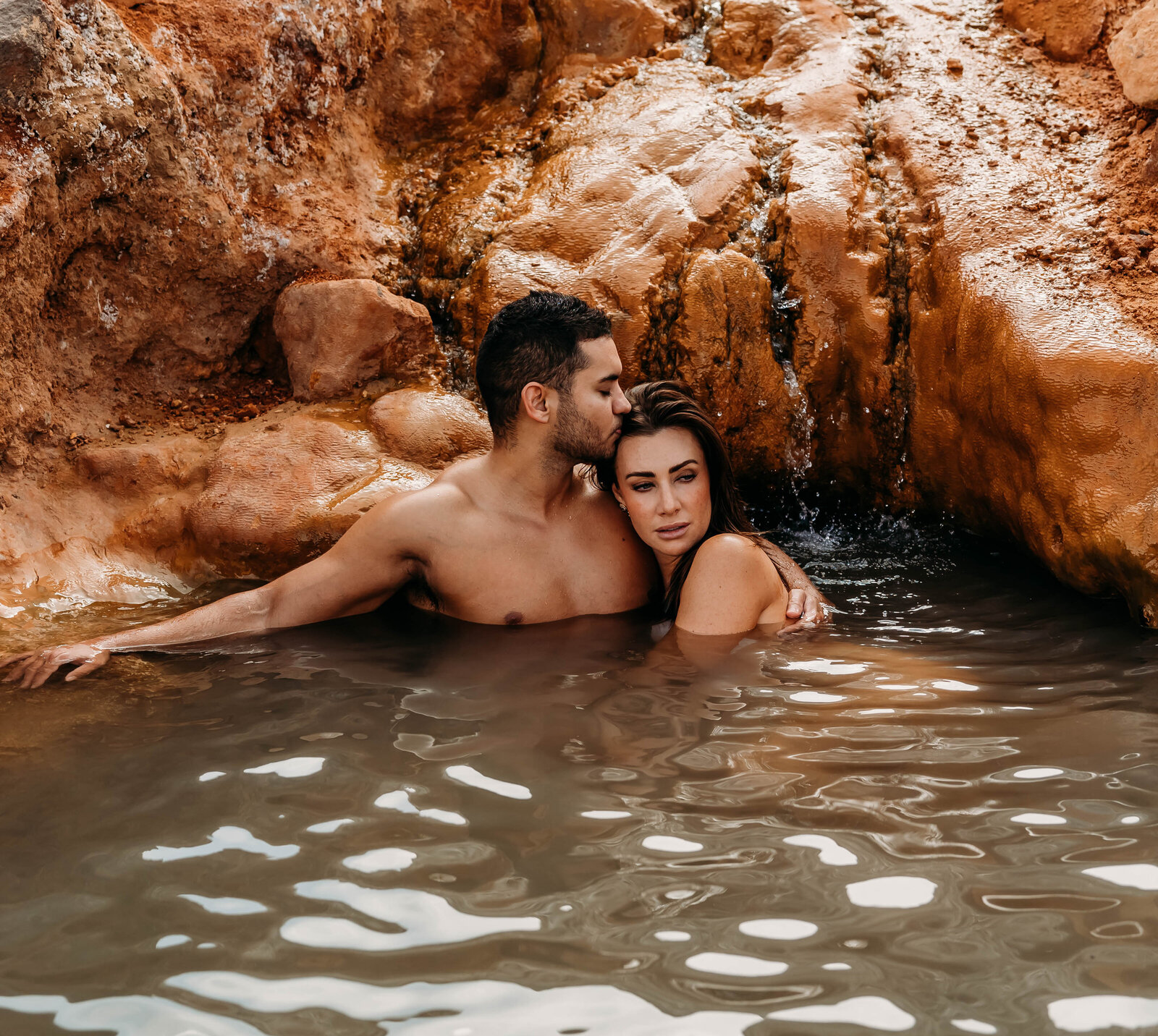 Romantic couples session at natural hot springs in Oregon.