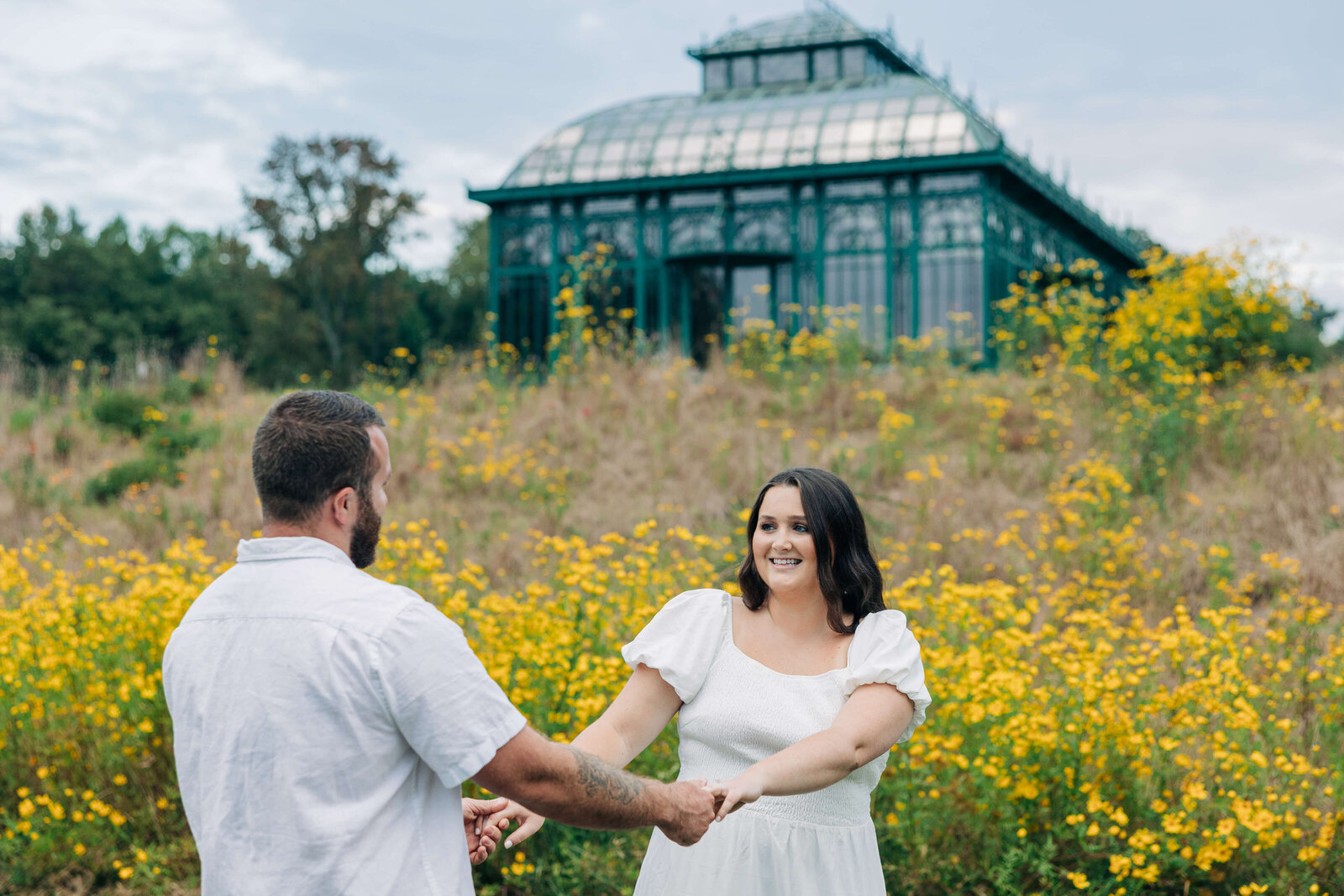 Couple-playing-in-field-The-Little-Chapel
