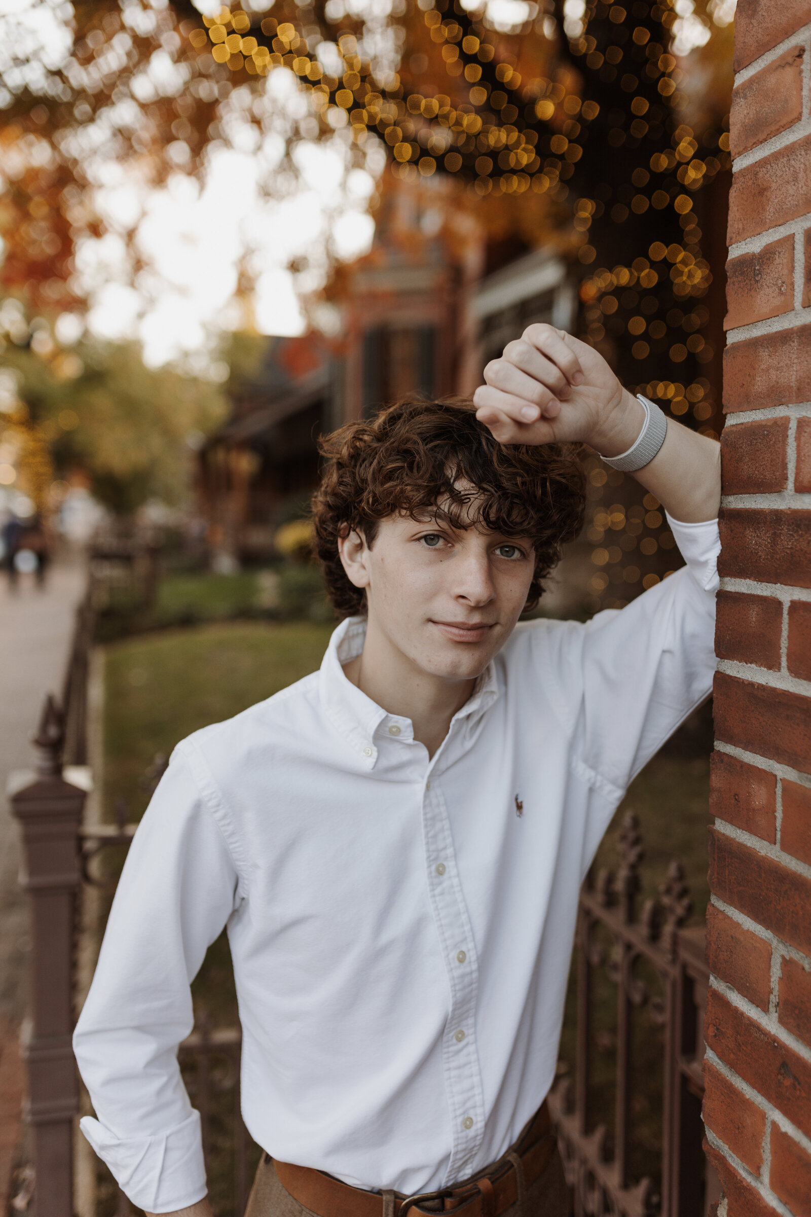 Historic Main street Downtown St. Charles senior session for St. CHarles High School senior