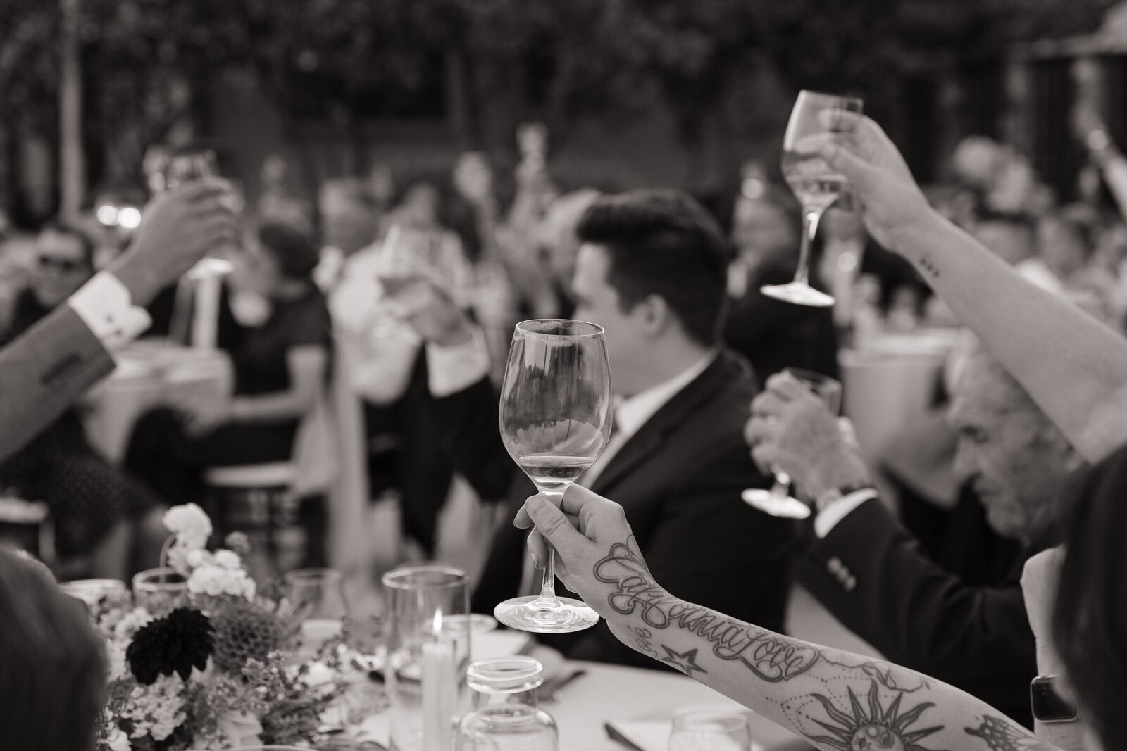 Wedding guests enjoying wedding by destination wedding photographer
