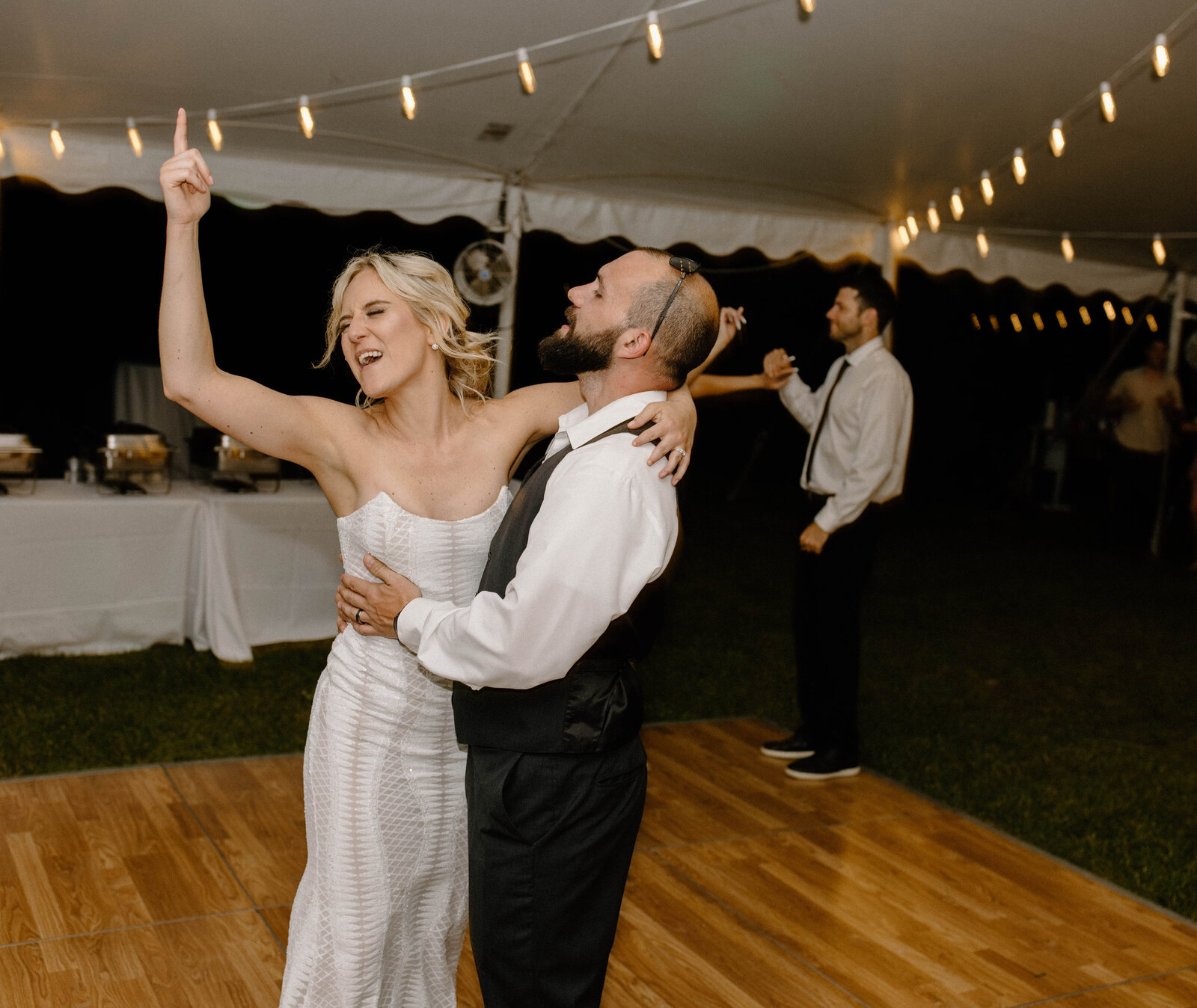 bride and groom dancing and singing at baltimore maryland wedding reception photos