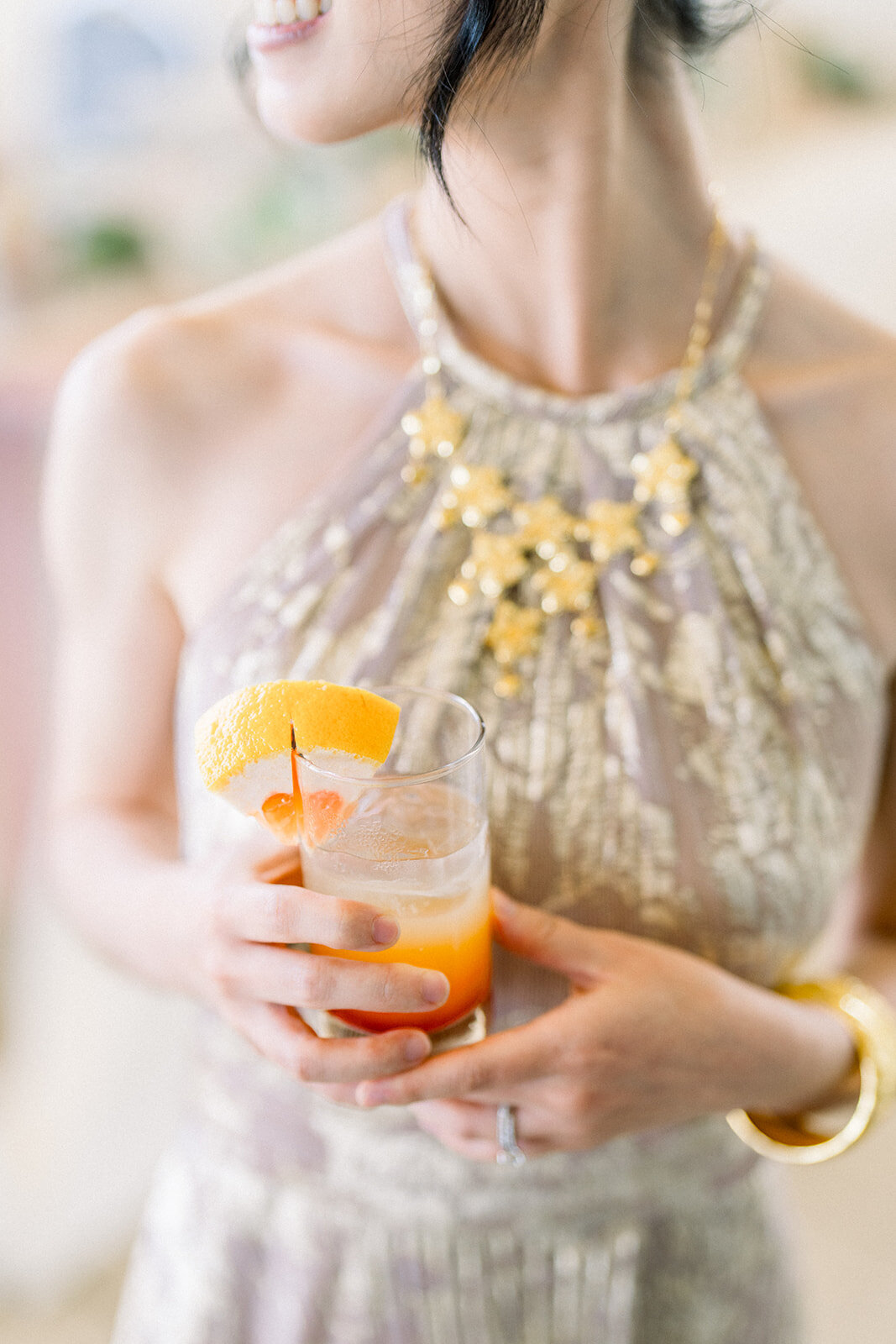 Close-up of a celebratory toast during the wedding reception at Filoli estate, capturing the joy and happiness of the occasion.