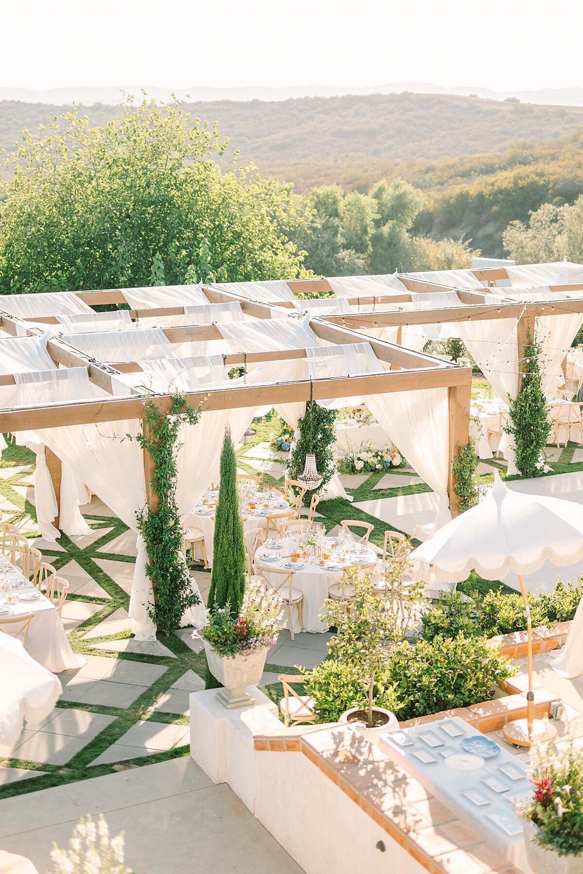 Citrus themed blue and orange wedding at Jeune Perché wedding venue in Fallbrook, California photographed by wedding photographer, Bree Sherr.