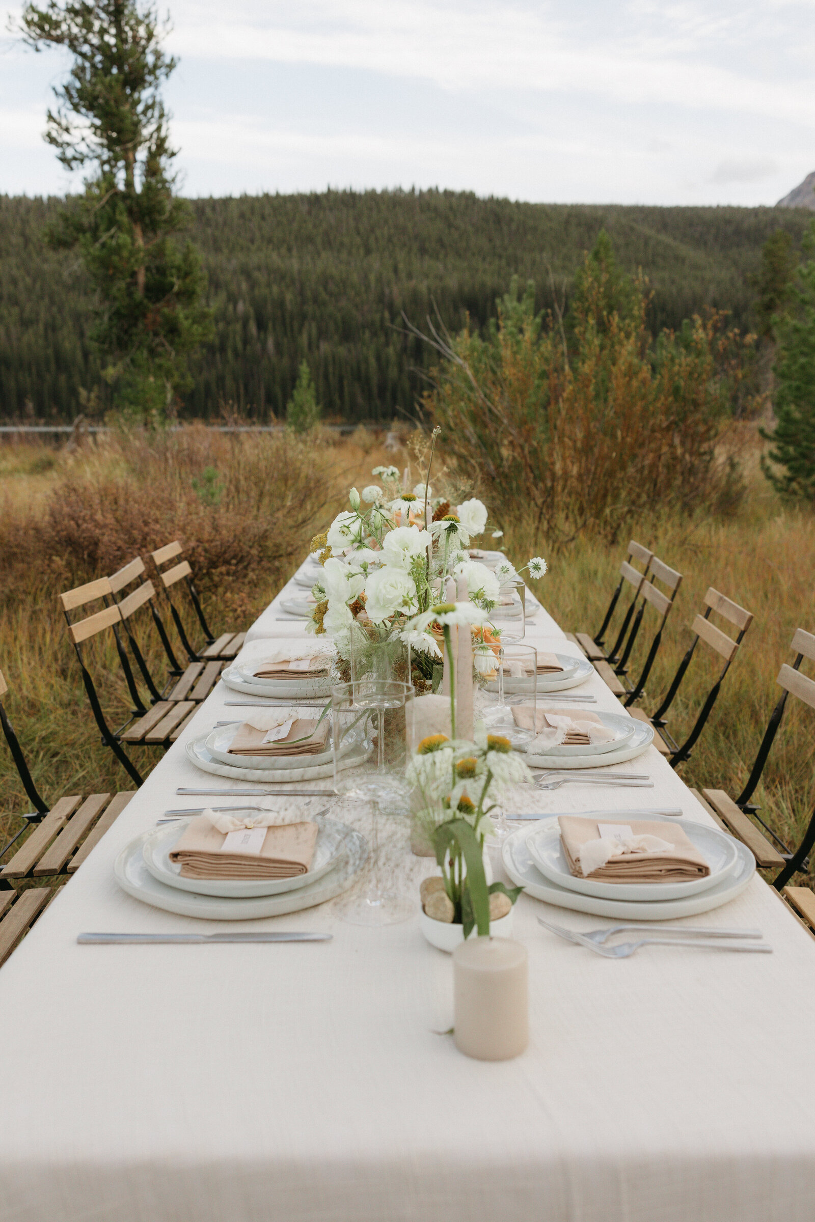 table set up in the sawtooth mountains for an intimate elopement