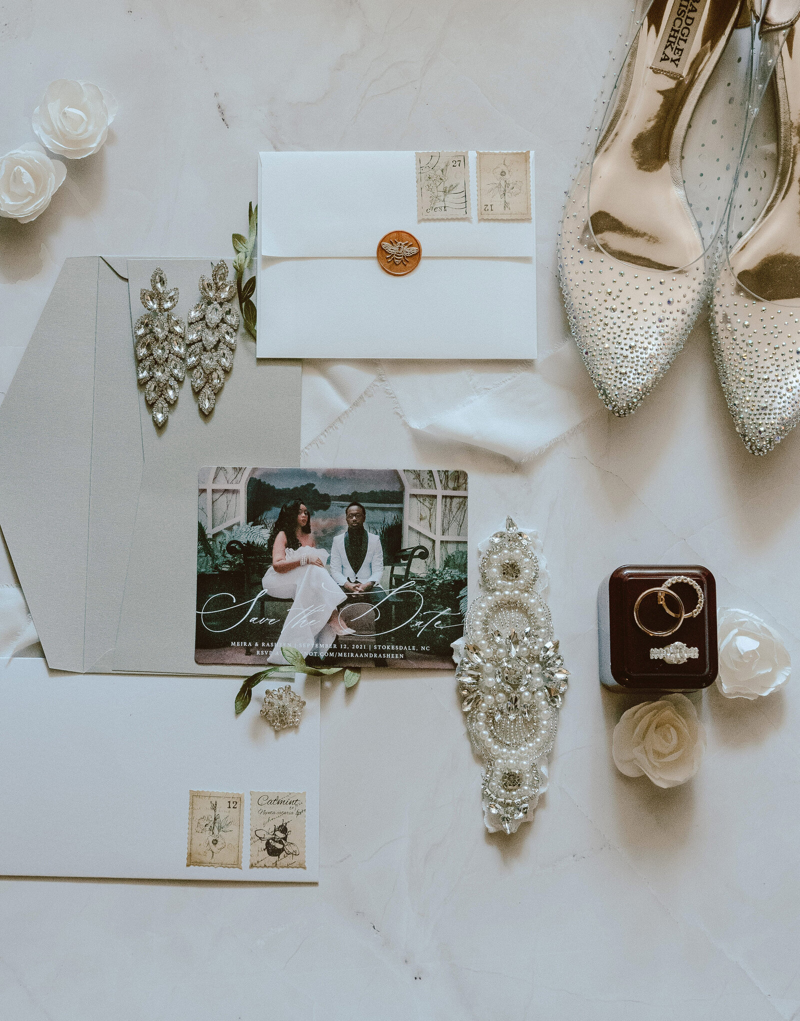 Elegant bridal details featuring luxury shoes, jewelry, and wedding invitation for a Raleigh wedding.