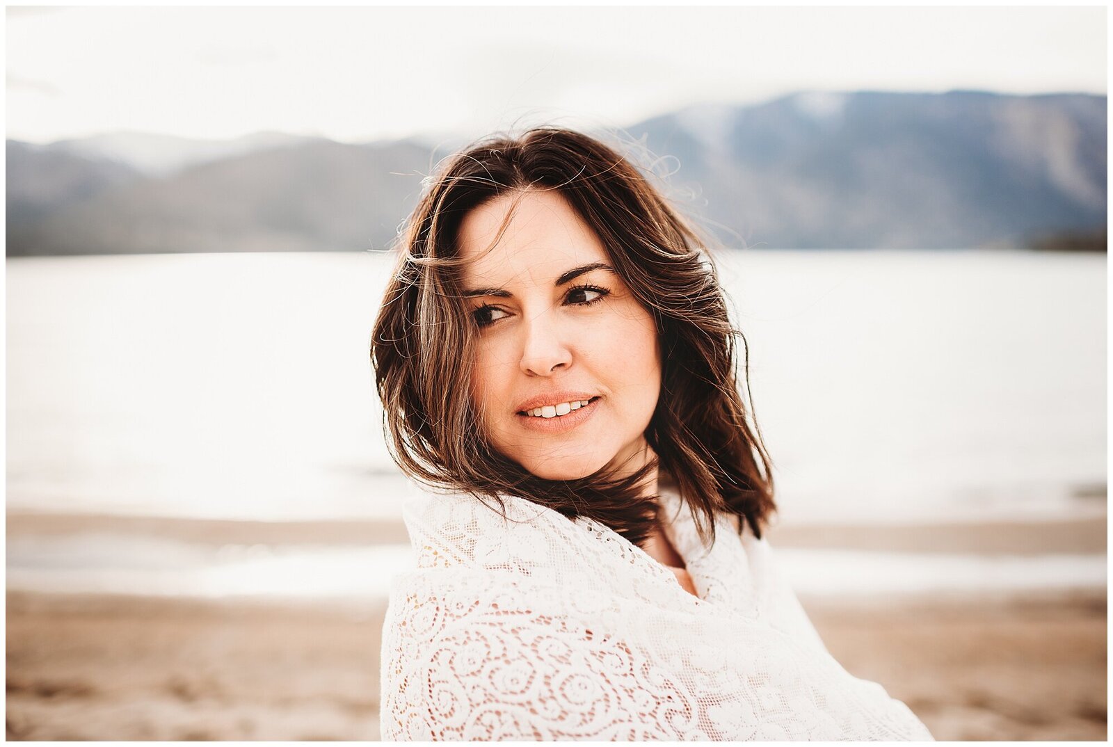 gorgeous portrait of woman in front of lake