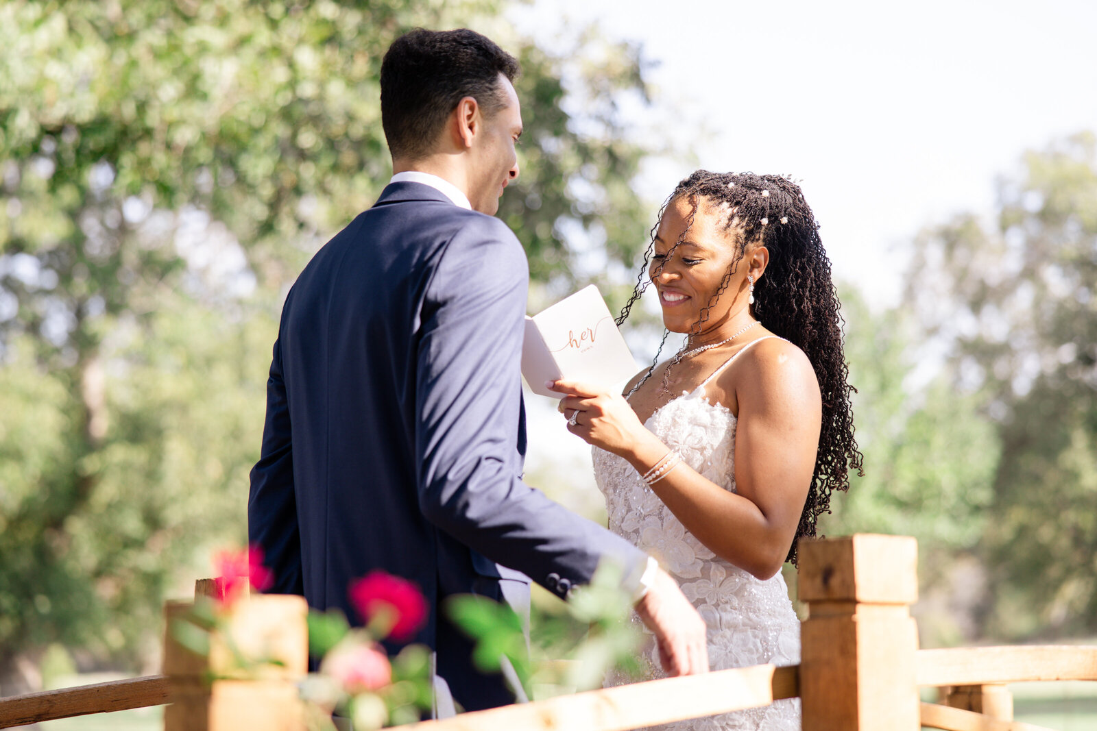 Bride reading personal vows to groom