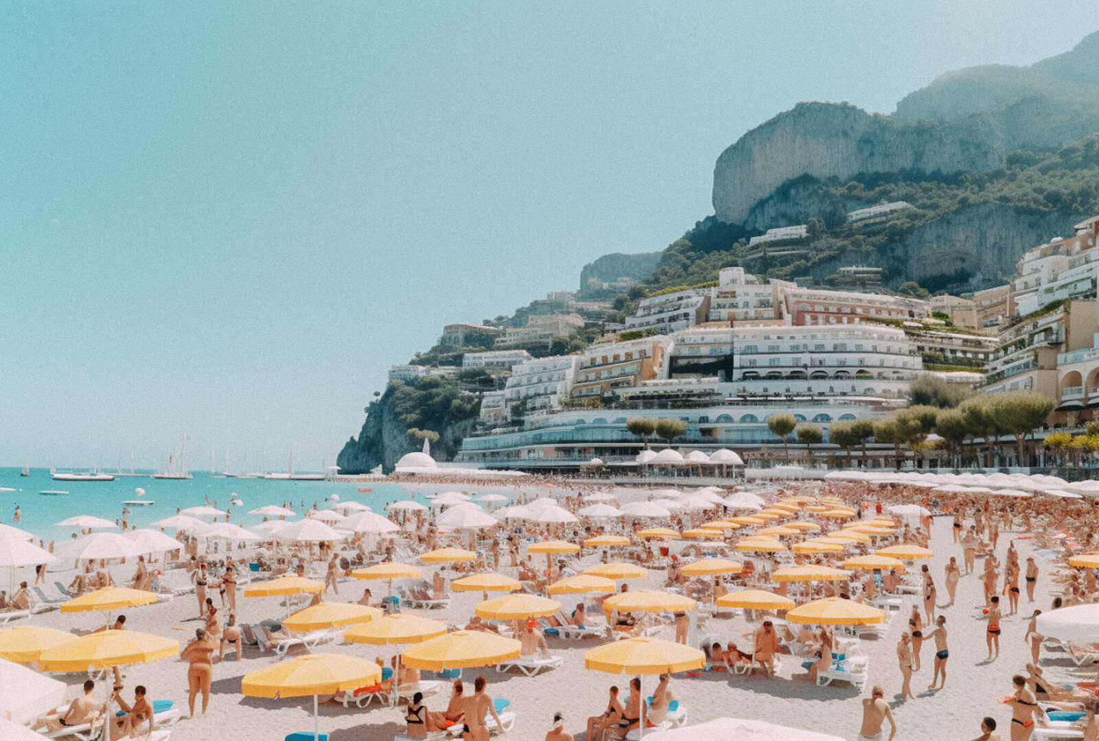 Sunny Coastal Retreat with Lively Beachgoers