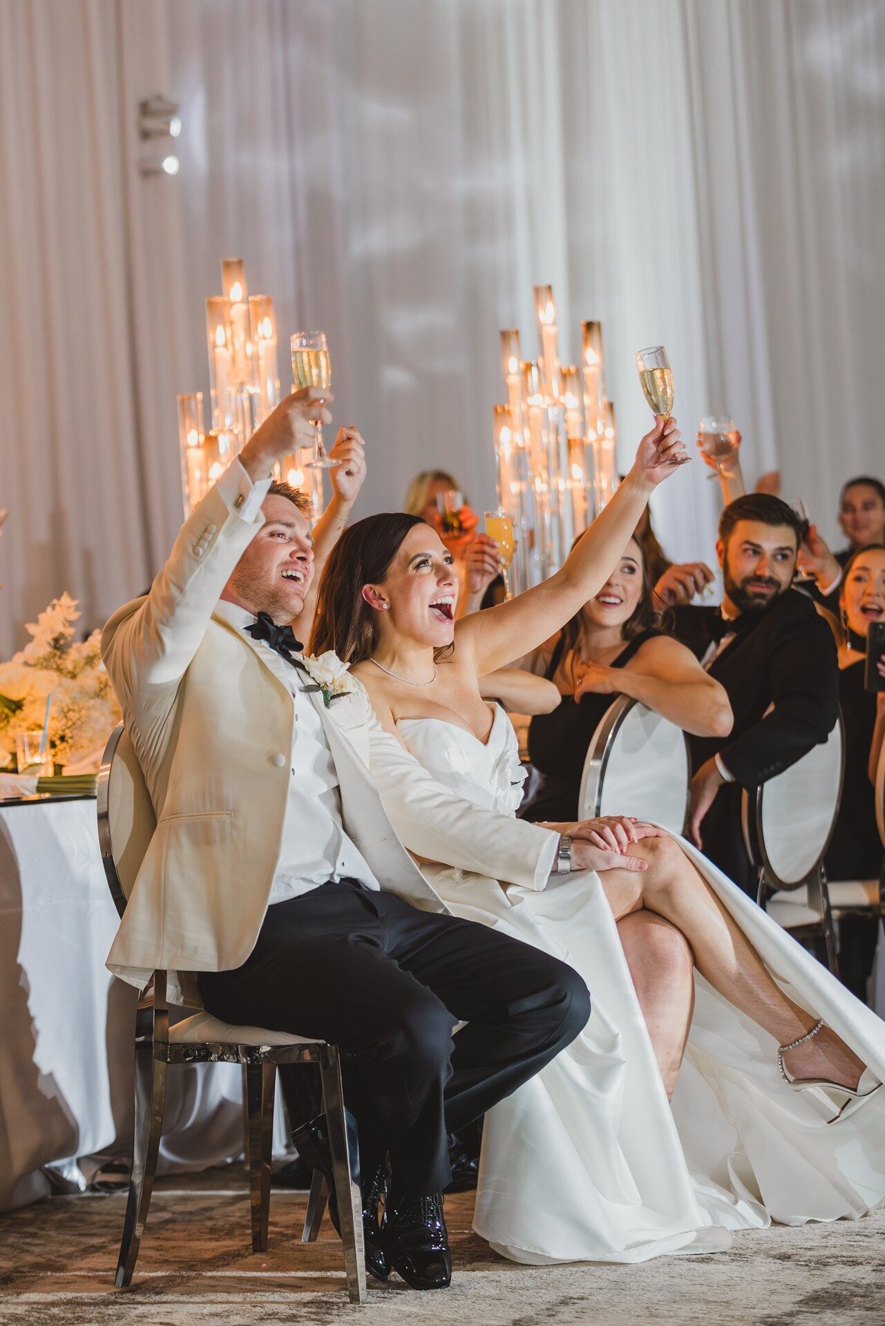bride-groom-raising-glasses