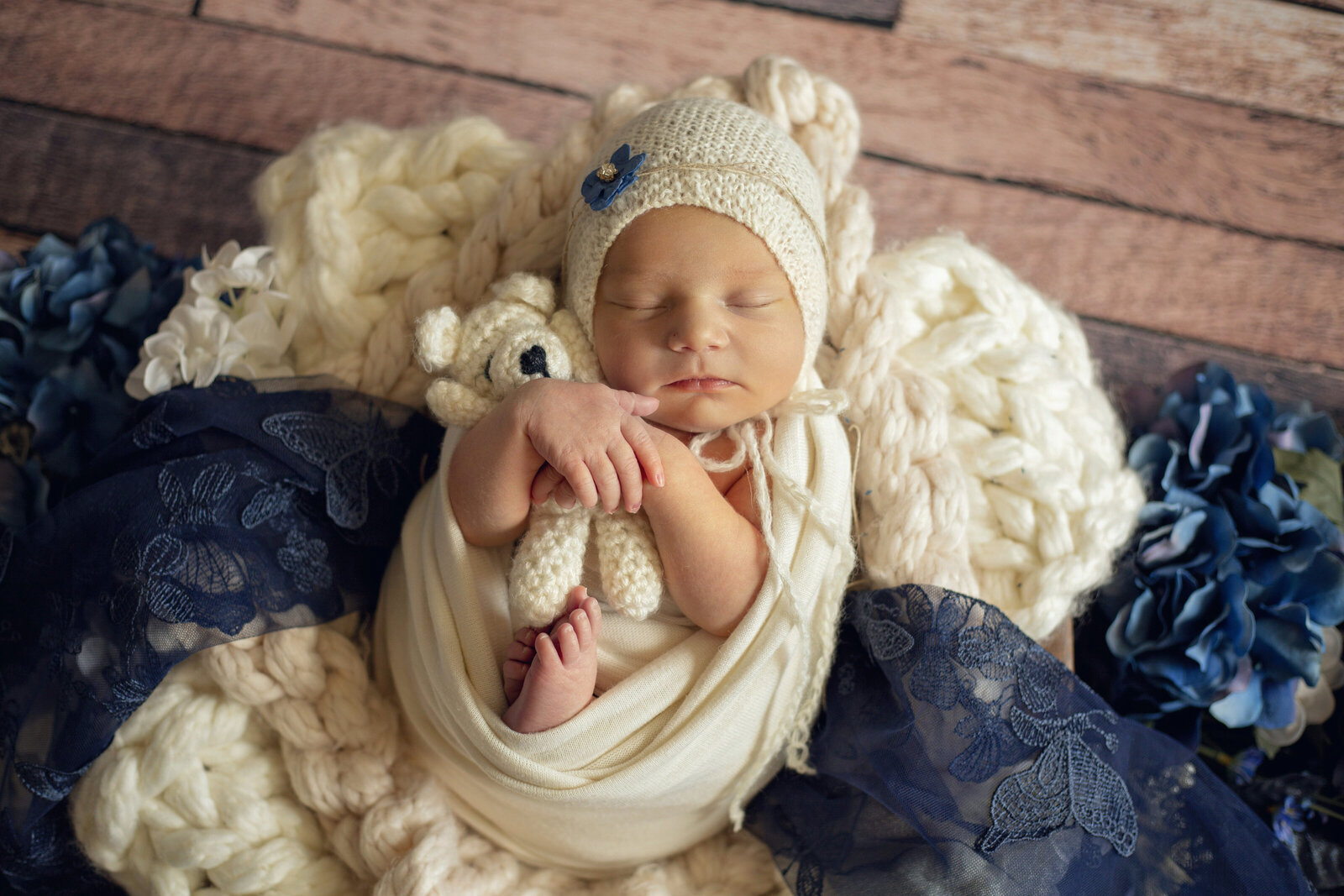 Newborn-session-in-ABQ-baby-girl-with-a-teddy-bear