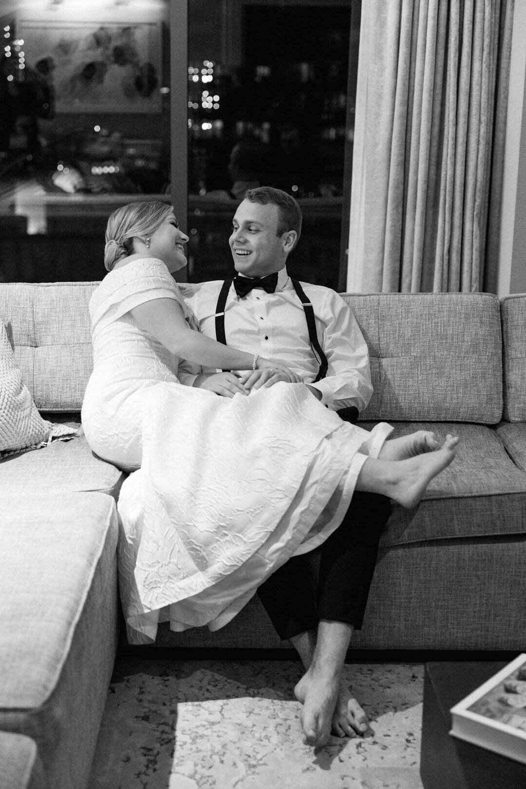 Black and white of Bride and Groom on Couch at St.Regis Atlanta
