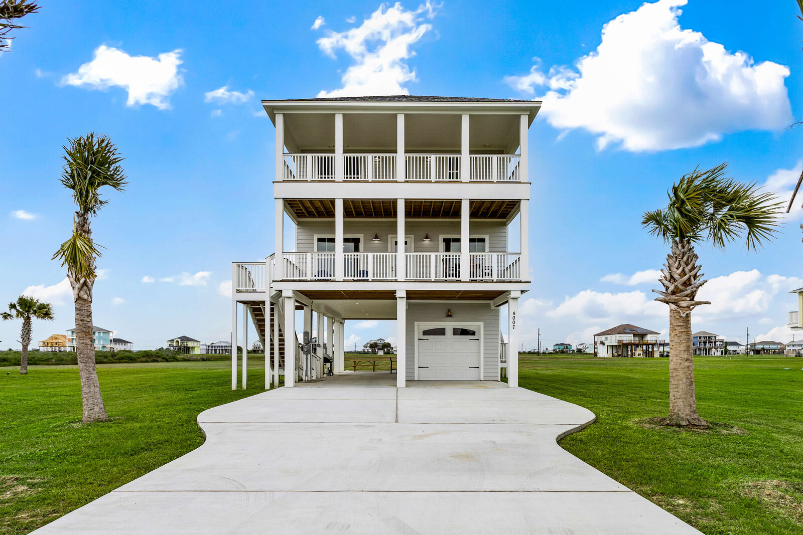 Front view of newly constructed coastal home in Indian Beach, Galveston.