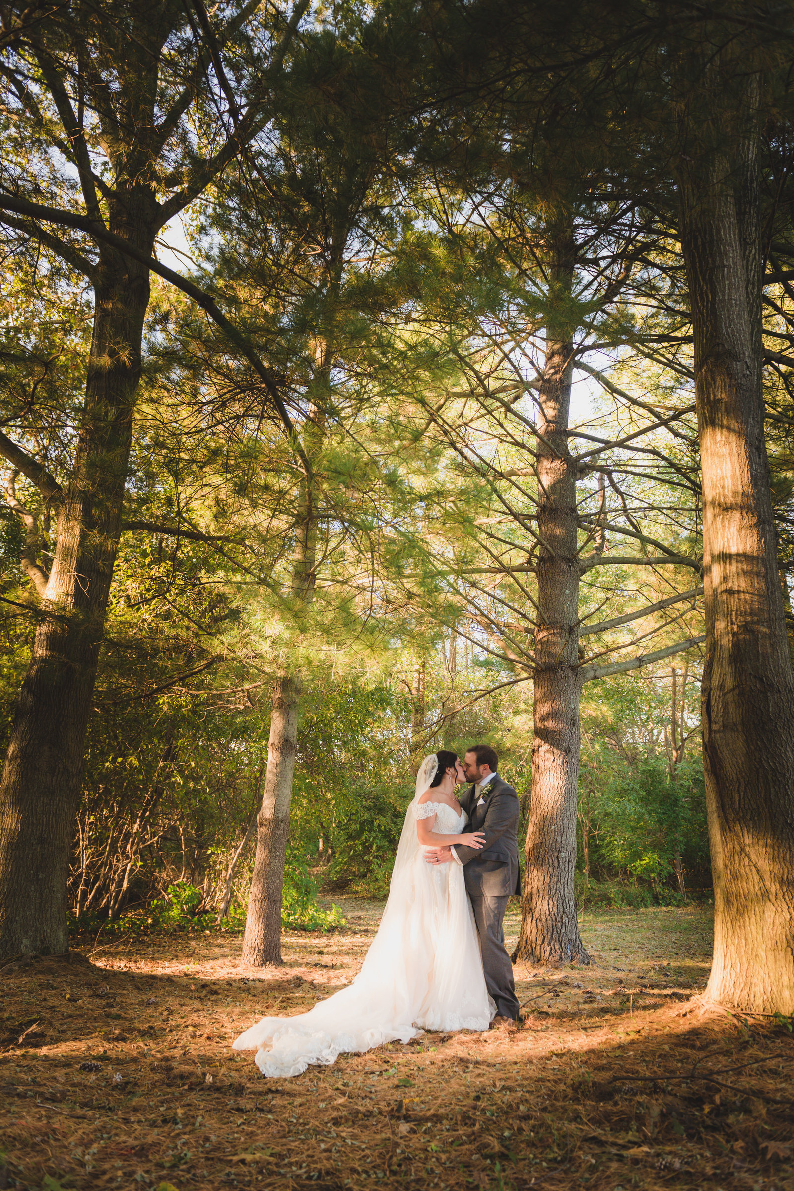 bride and groom posing at The Barn at Old Bethpage