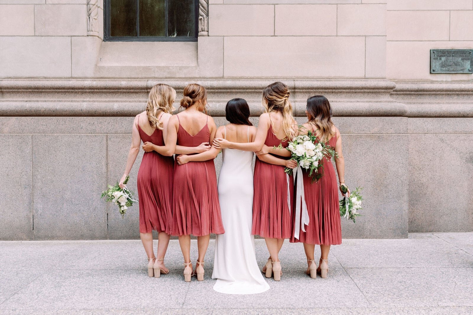 Modern Bride with bridesmaids crimson red dresses by Aritzia editorial wedding at hotel ocho toronto jacqueline james photography