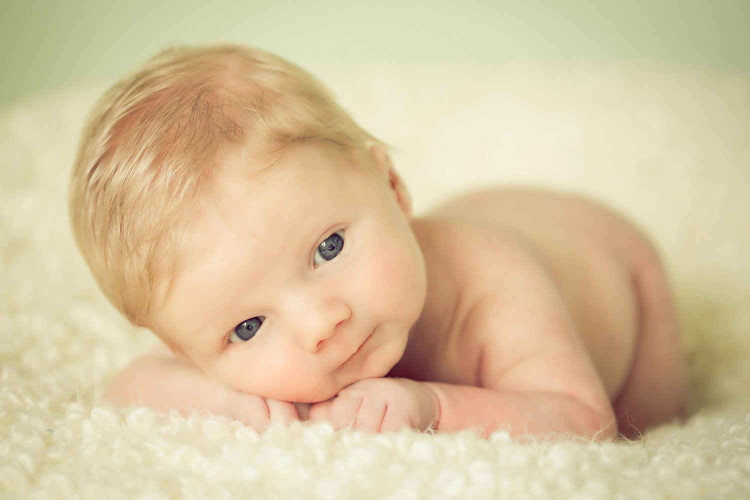 san diego newborn photography | baby boy newborn with big blue eyes and white blanket