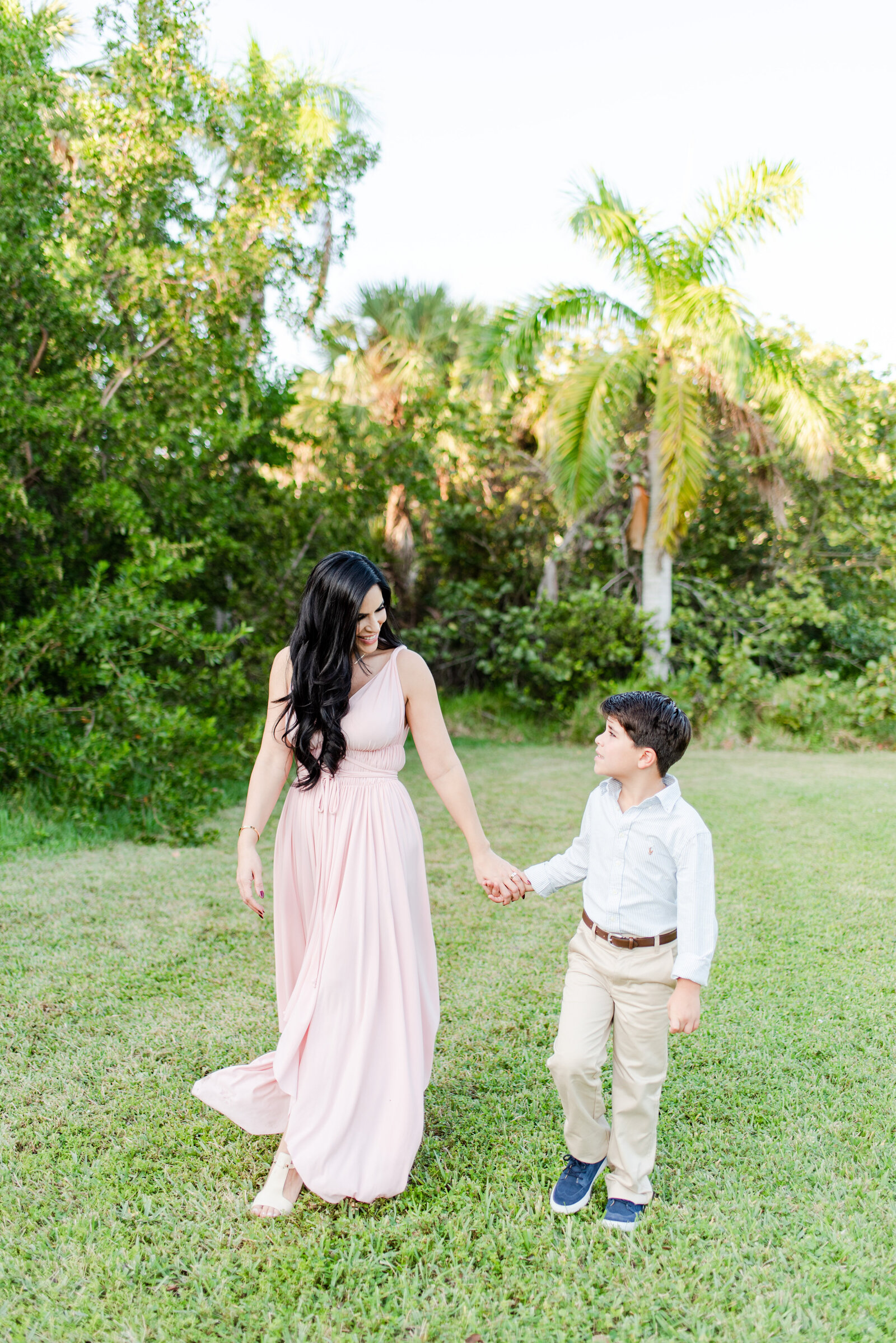 mom and son walking picnic family session at hugh birch state park Miami lifestyle photographers David and Meivys of MSP Photography
