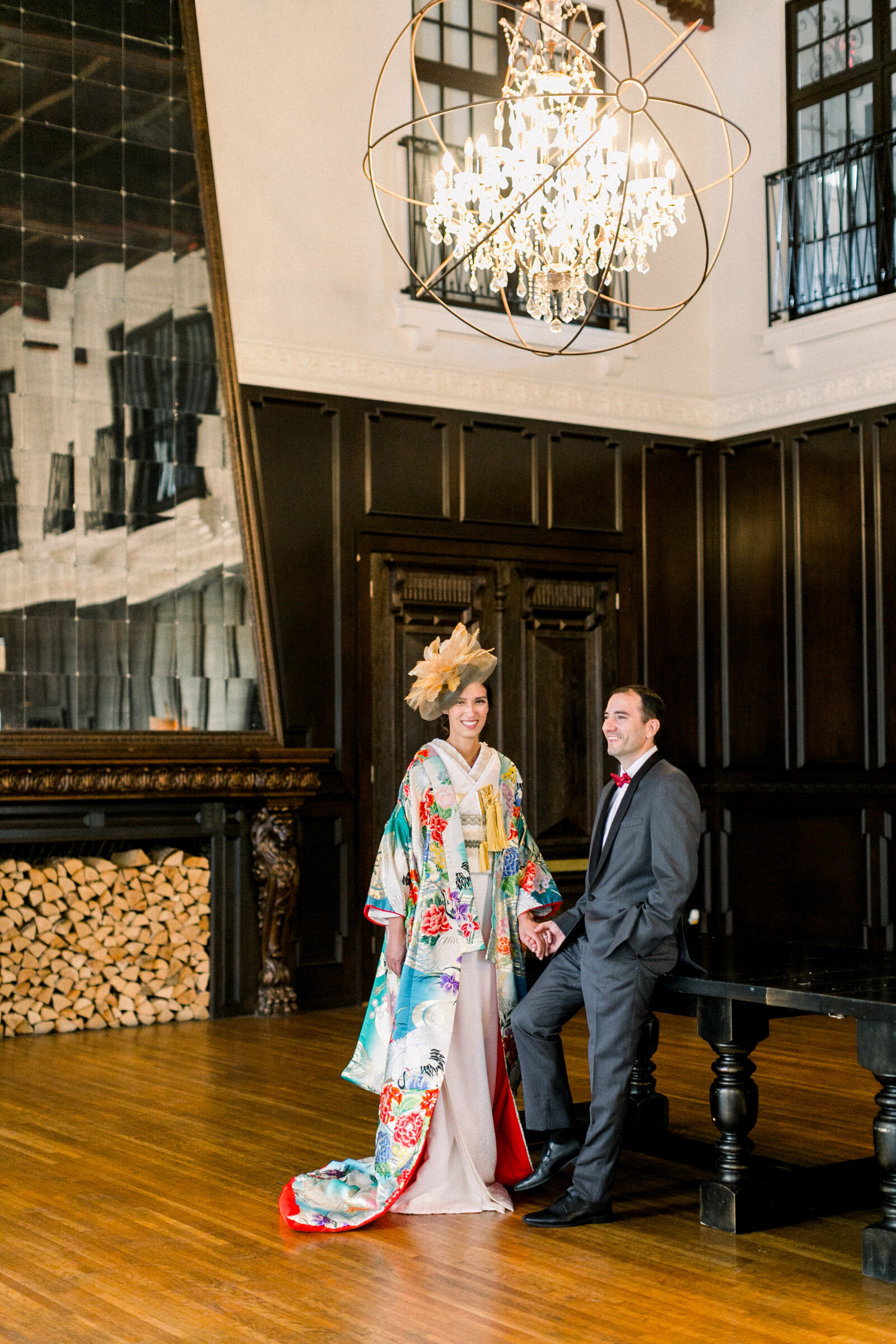 Elegant wedding couple at The Ebell Club Long Beach, bride in colorful uchikake wedding kimono and groom in dark suit, perfect for wedding kimono rental in Los Angeles | ロサンゼルスのThe Ebell Club Long Beachで色打掛花嫁とダークスーツ新郎のエレガントな着物レンタル和婚ショット