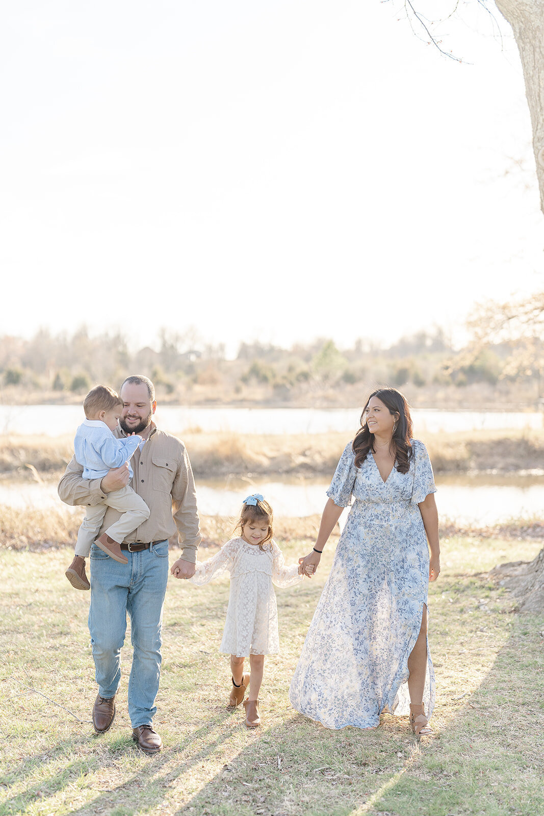 family smiling for photos in Reston, VA