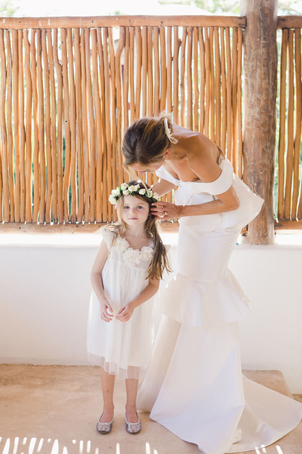Bride with flower girl for  wedding at Hotel Esencia