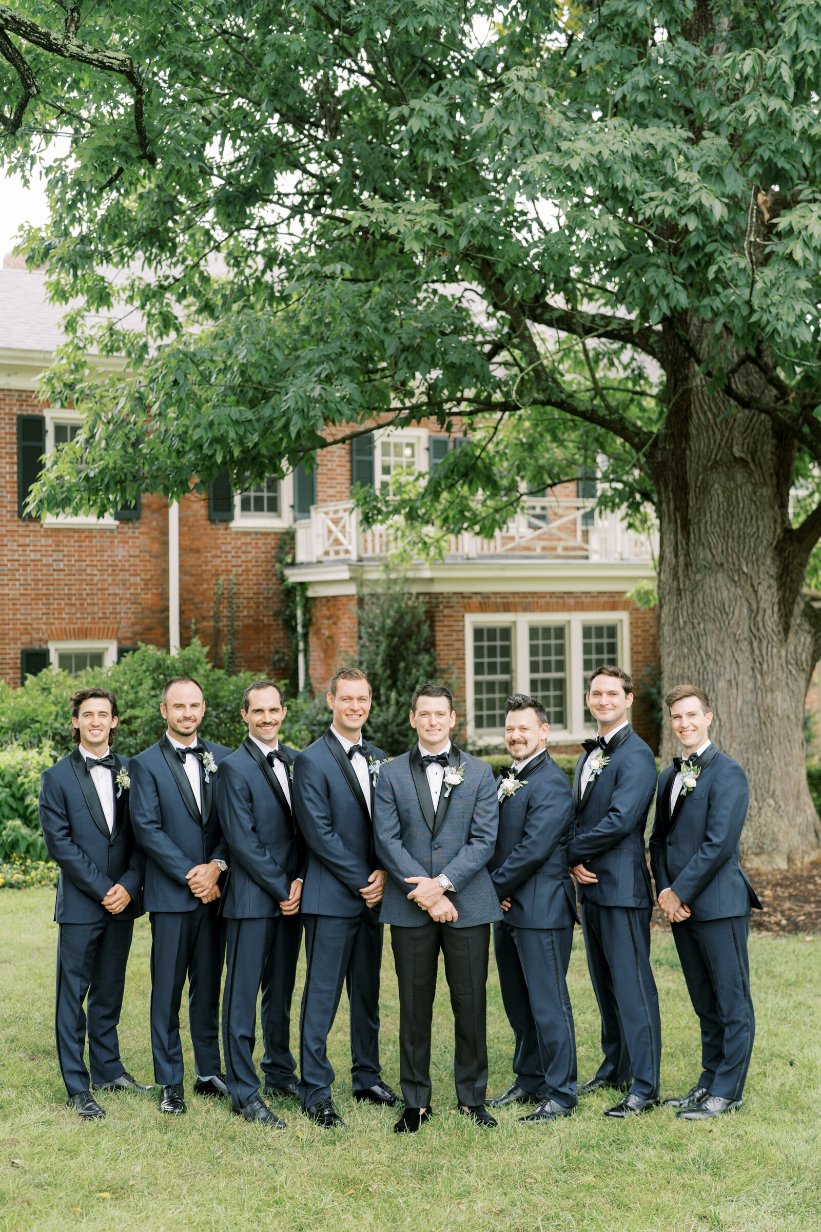 Groom and groomsmen outside French House