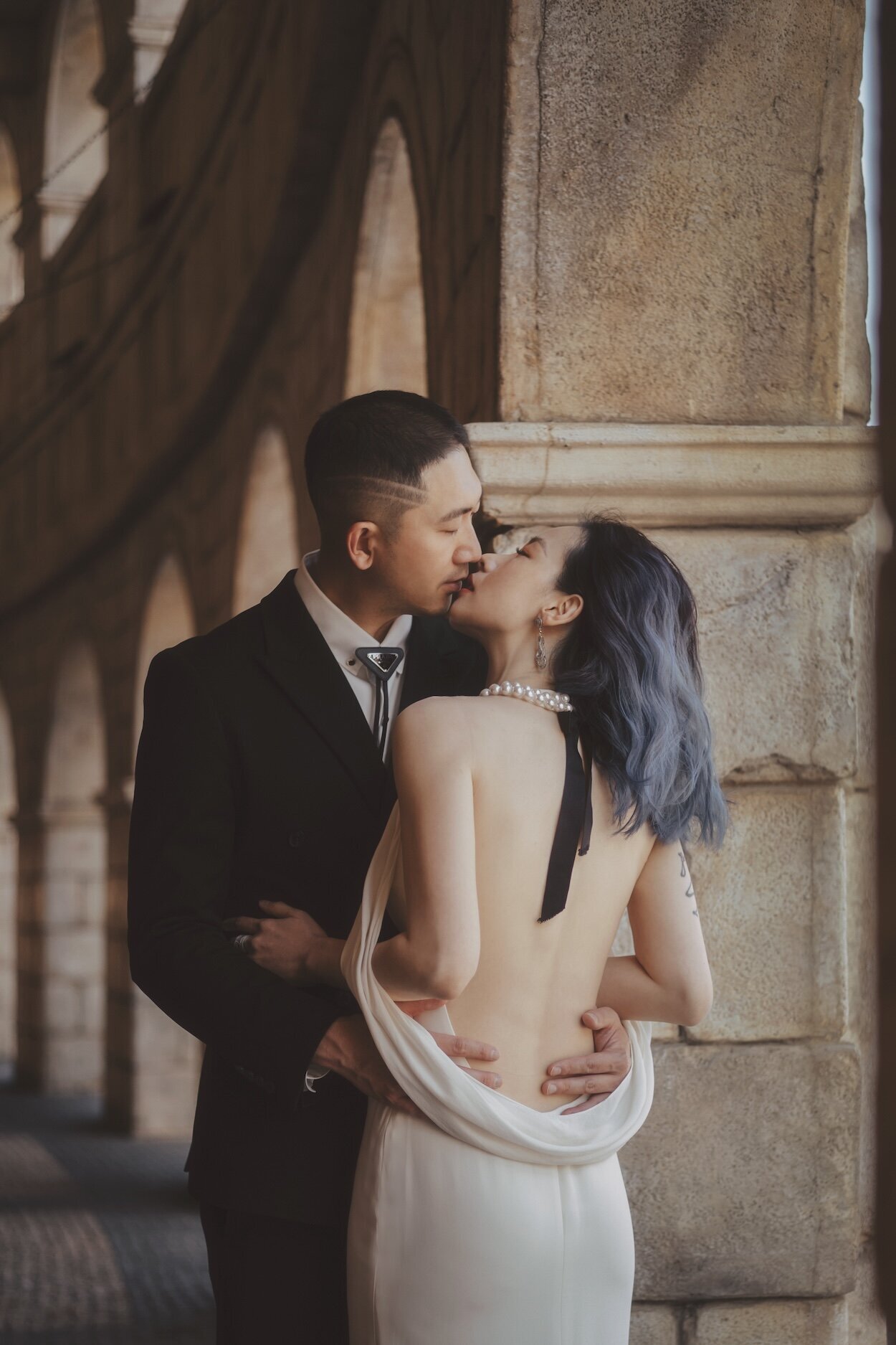 Tracy & Prescott of 3N7LOVE  in an embrace at a photoshoot in Macau.