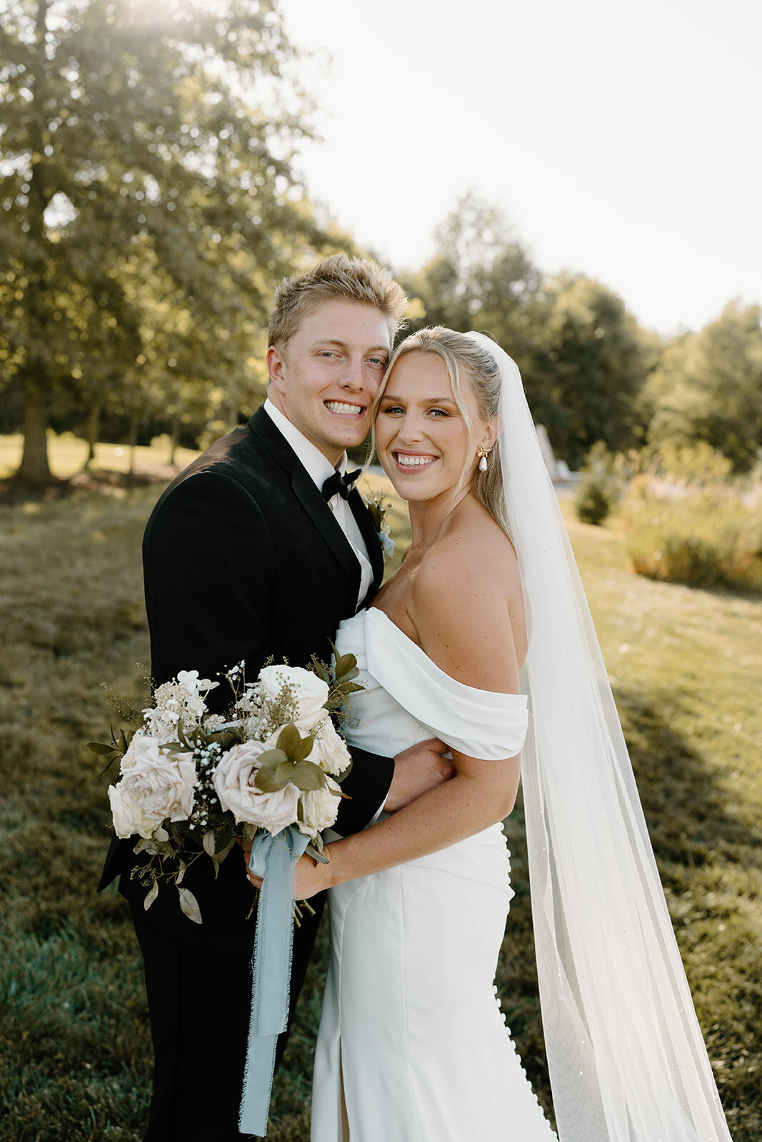 Experience the breathtaking moments from Stephanie and Grant Yeater’s wedding at Retreat 21 in Marysville, OH. This stunning outdoor oasis served as the perfect backdrop for their elegant celebration. From heartfelt vows in the garden-chic ceremony space to the joy-filled reception under panoramic views, every detail was thoughtfully curated for an unforgettable day. Explore their wedding gallery to relive these magical moments, captured with love and attention to every unique aspect of their day.