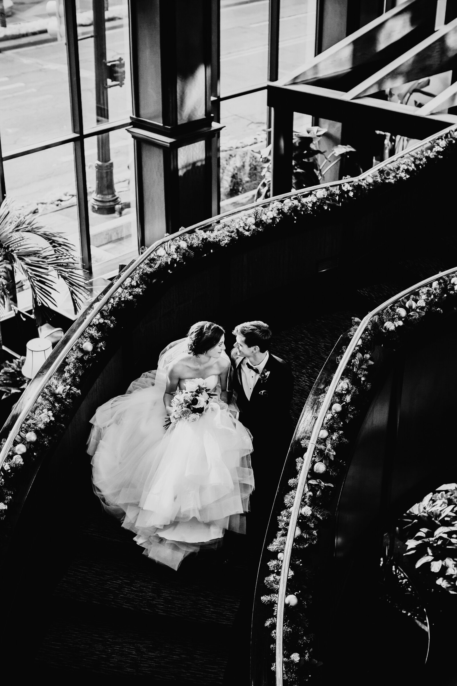 Bride and Groom Kissing on the steps of Grand Rapids Michigan art museum