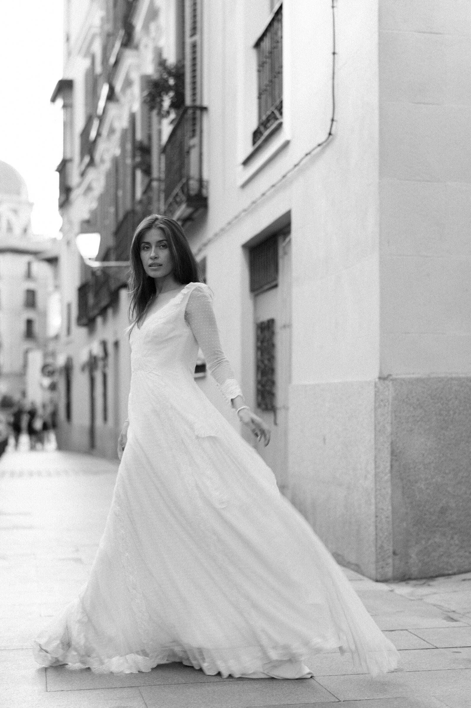 Model in the streets of Madrid,  Spain wearing Lamarye gown