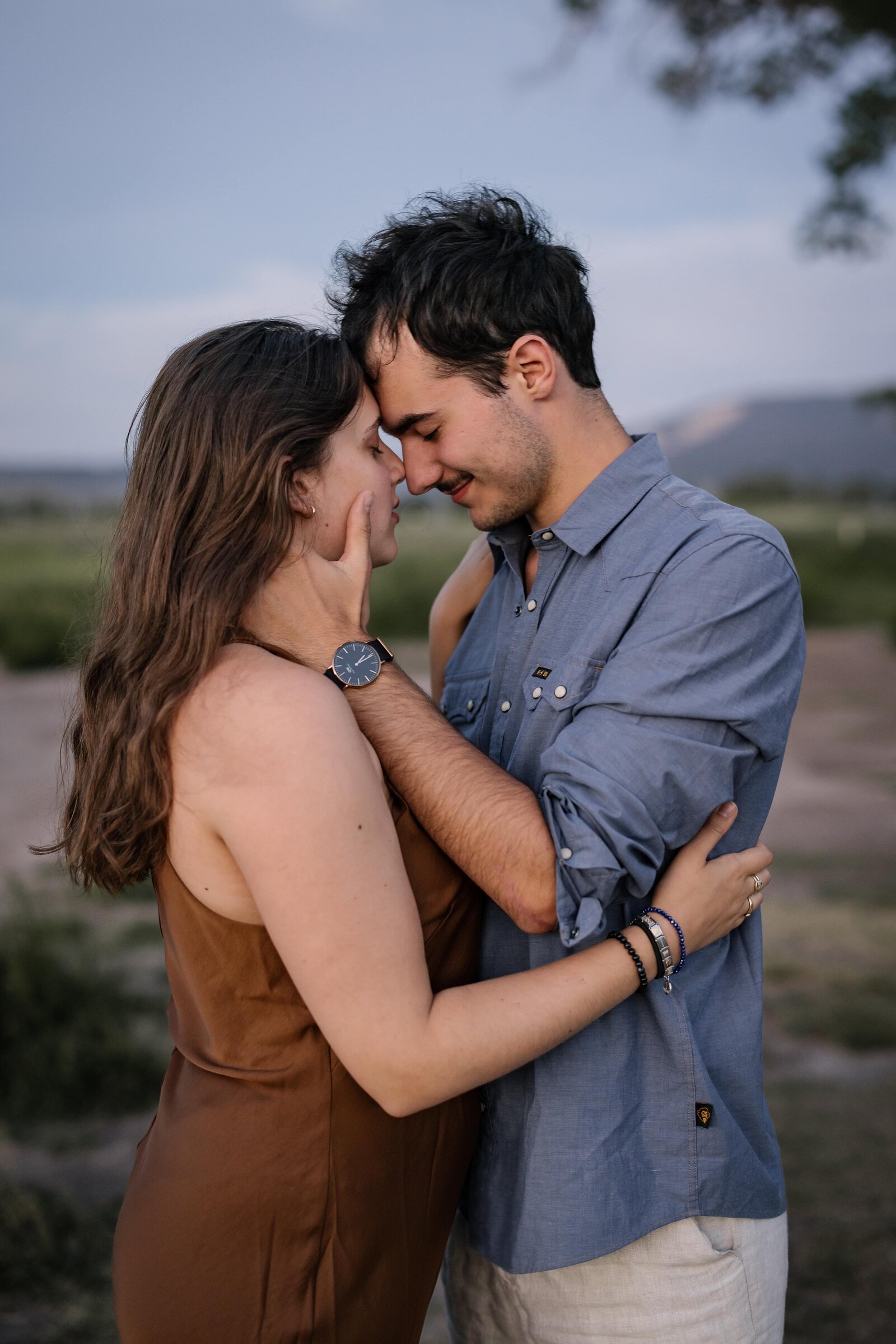 groom holding bride's face