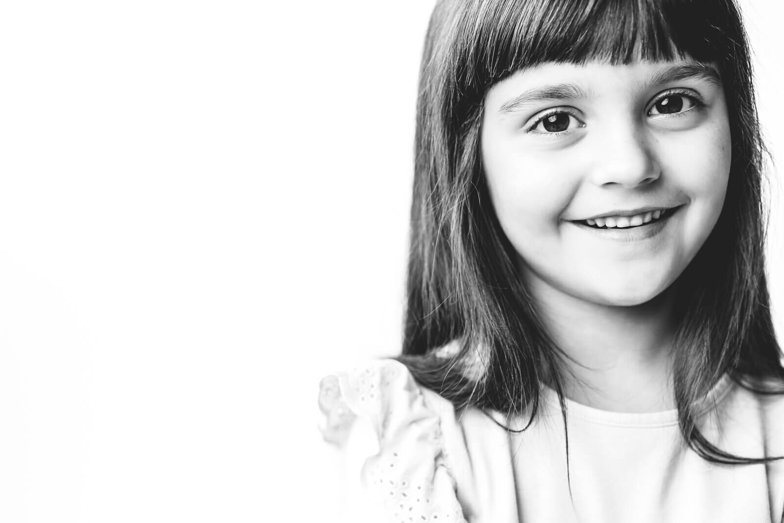 Professional portrait of girl with straight bangs