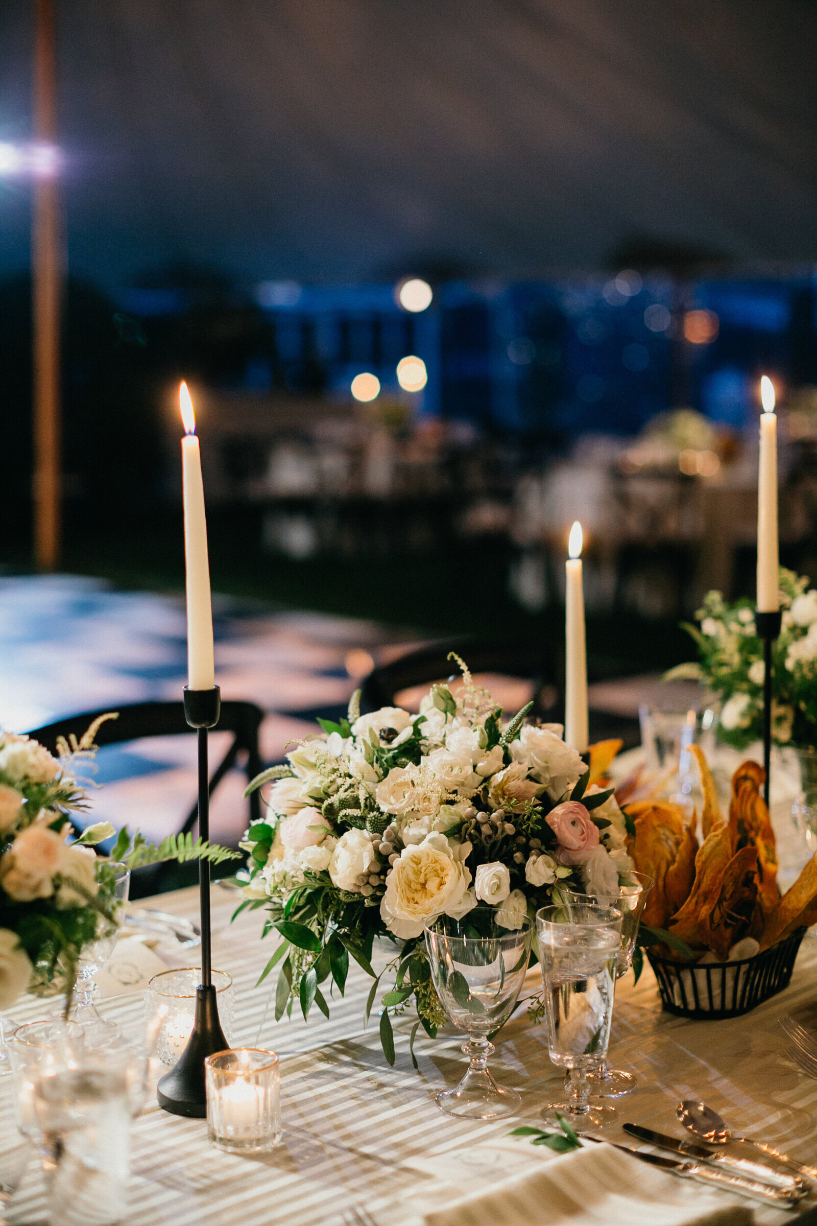 Tented dinner scene at a Radnor Hunt Landing wedding.