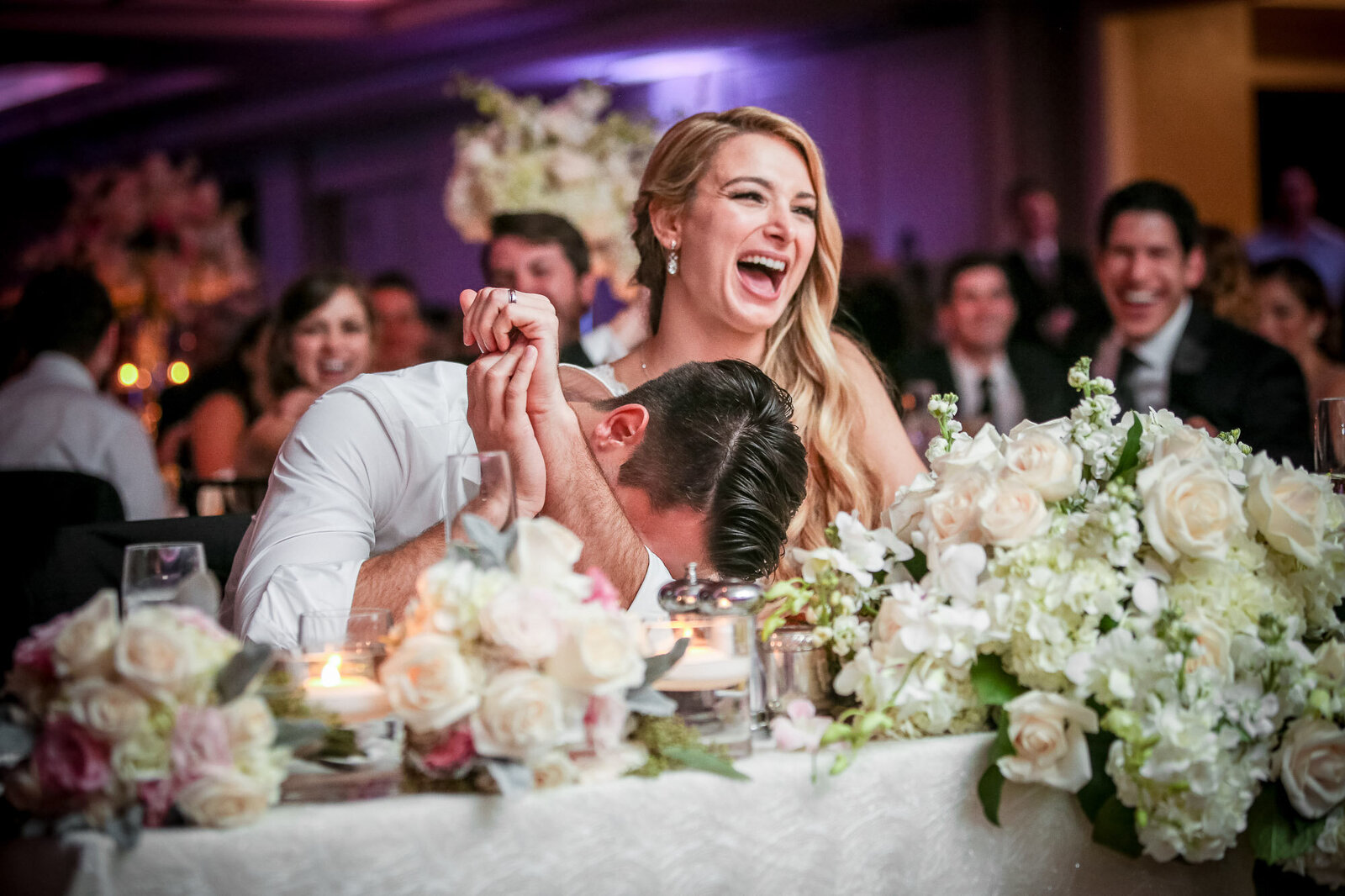 bride-groom-laughing-at-speeches