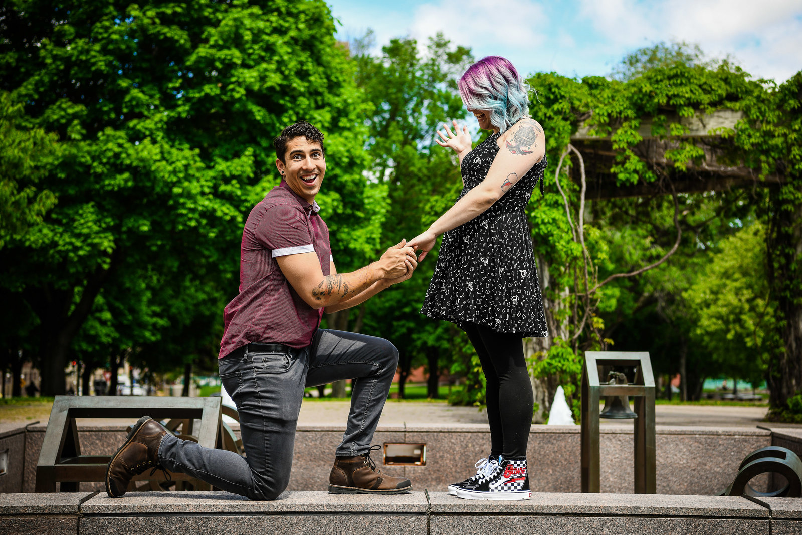 Man proposes to woman with rainbow hair and tattoos