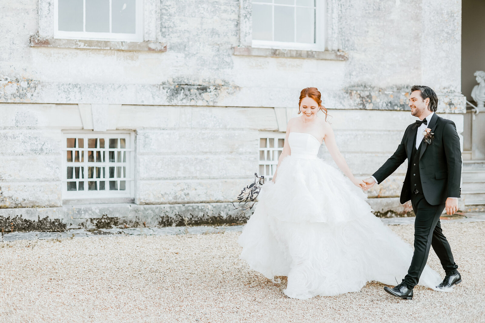 Came-House-wedding-venue-Dorset-bride-and-groom-walking