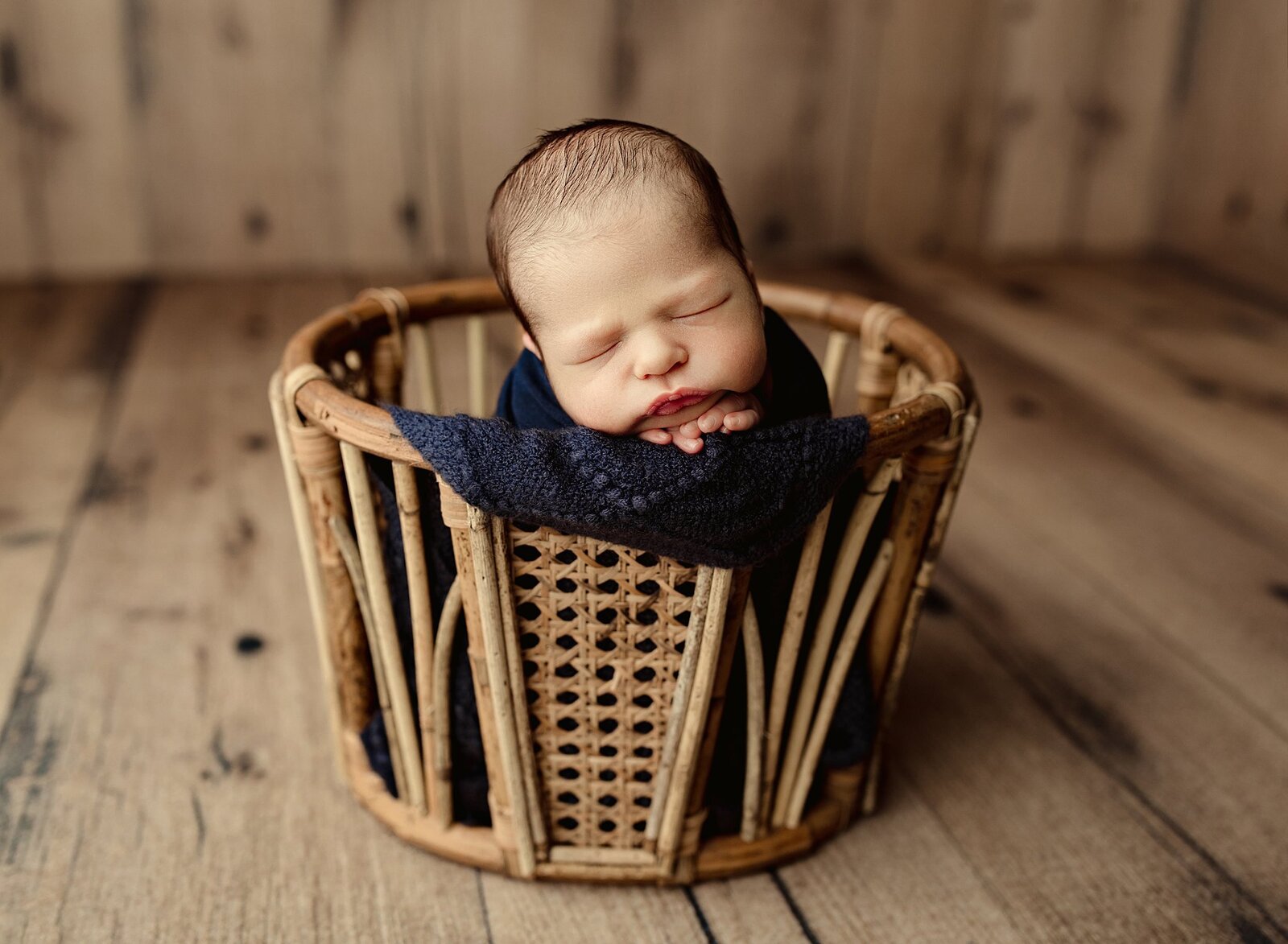 baby bot in a wicker basket.