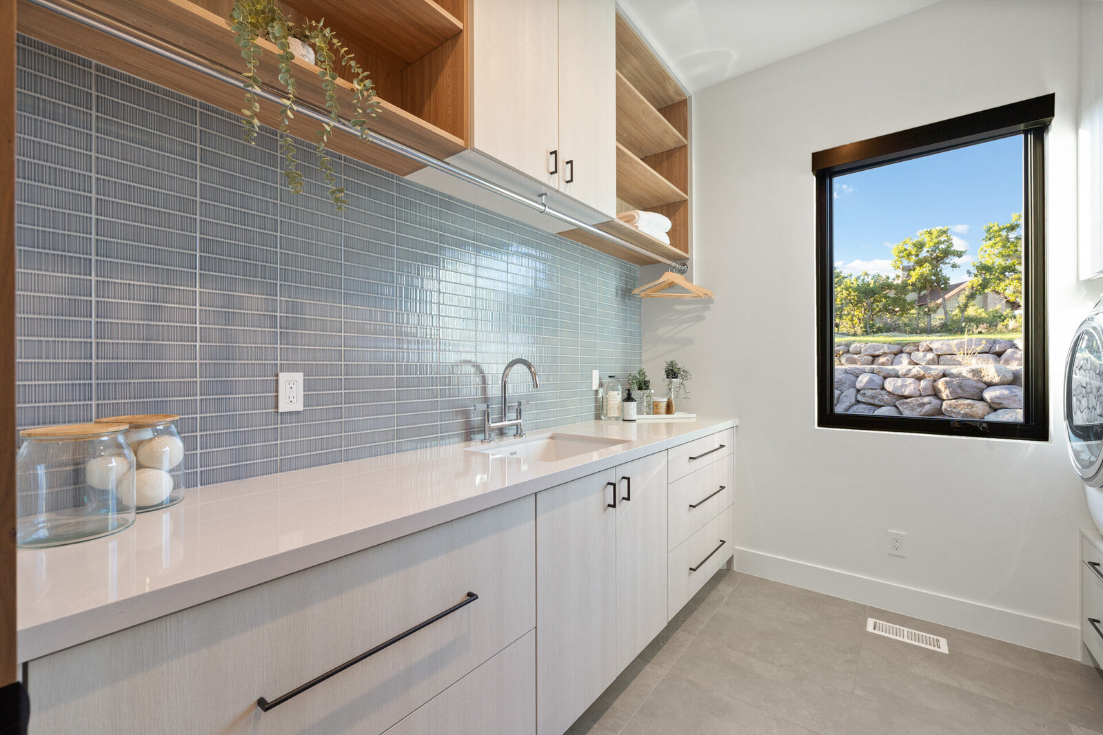 Chalet-and-Co-Park-City-Interior-Designer-blue-tiled-backsplash-laundry-room