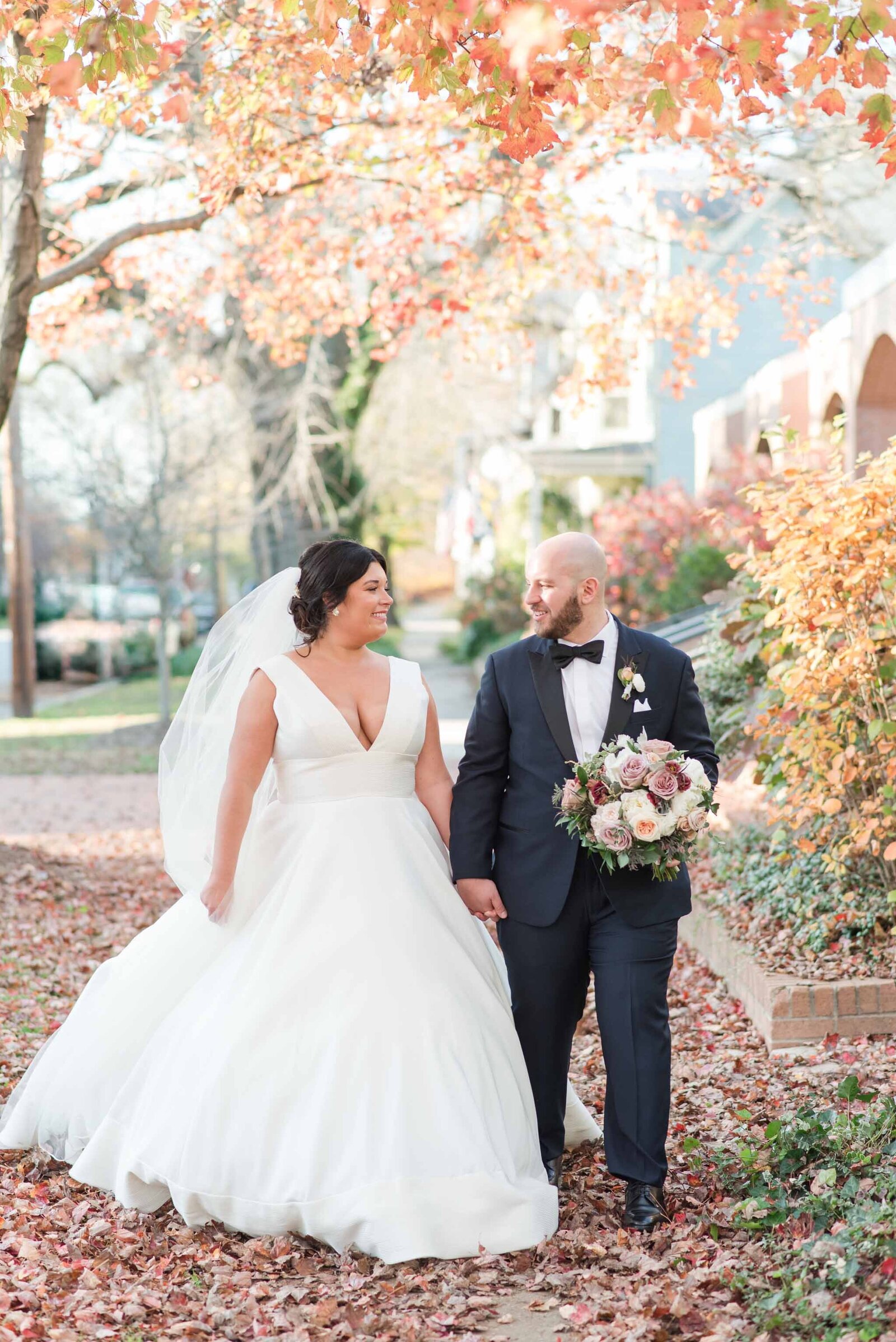 downtown chestertown  maryland couple walking on sidewalk at fall