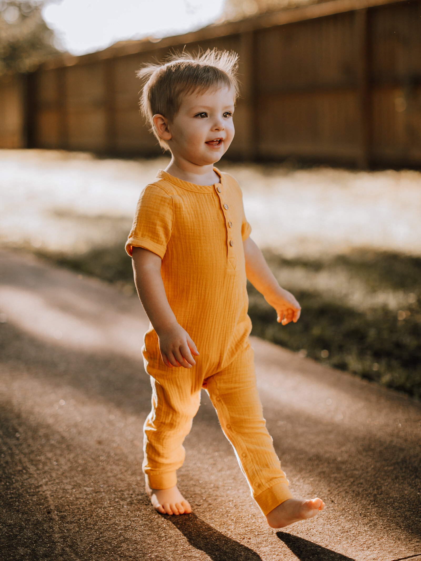 Henley Short-sleeved Jumpsuit in Mustard Fits size 18 month