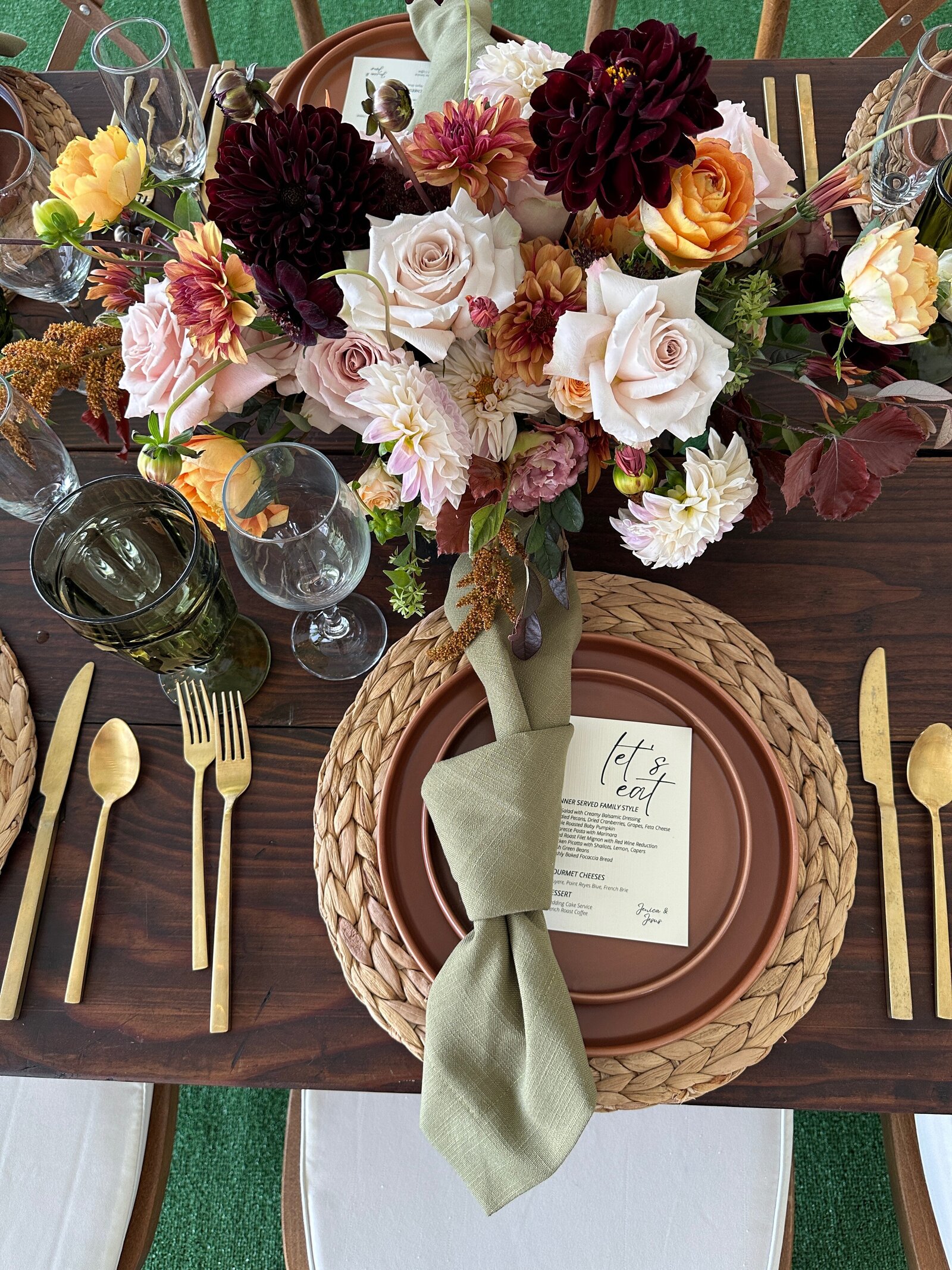 Boho wedding placesetting with gold flatware