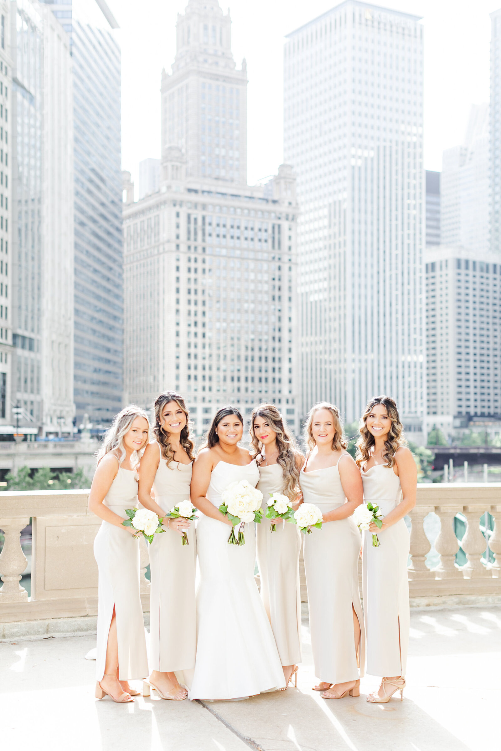 9_bridesmaids_with_illuminating_light_wrigley_building_downtown_chicago